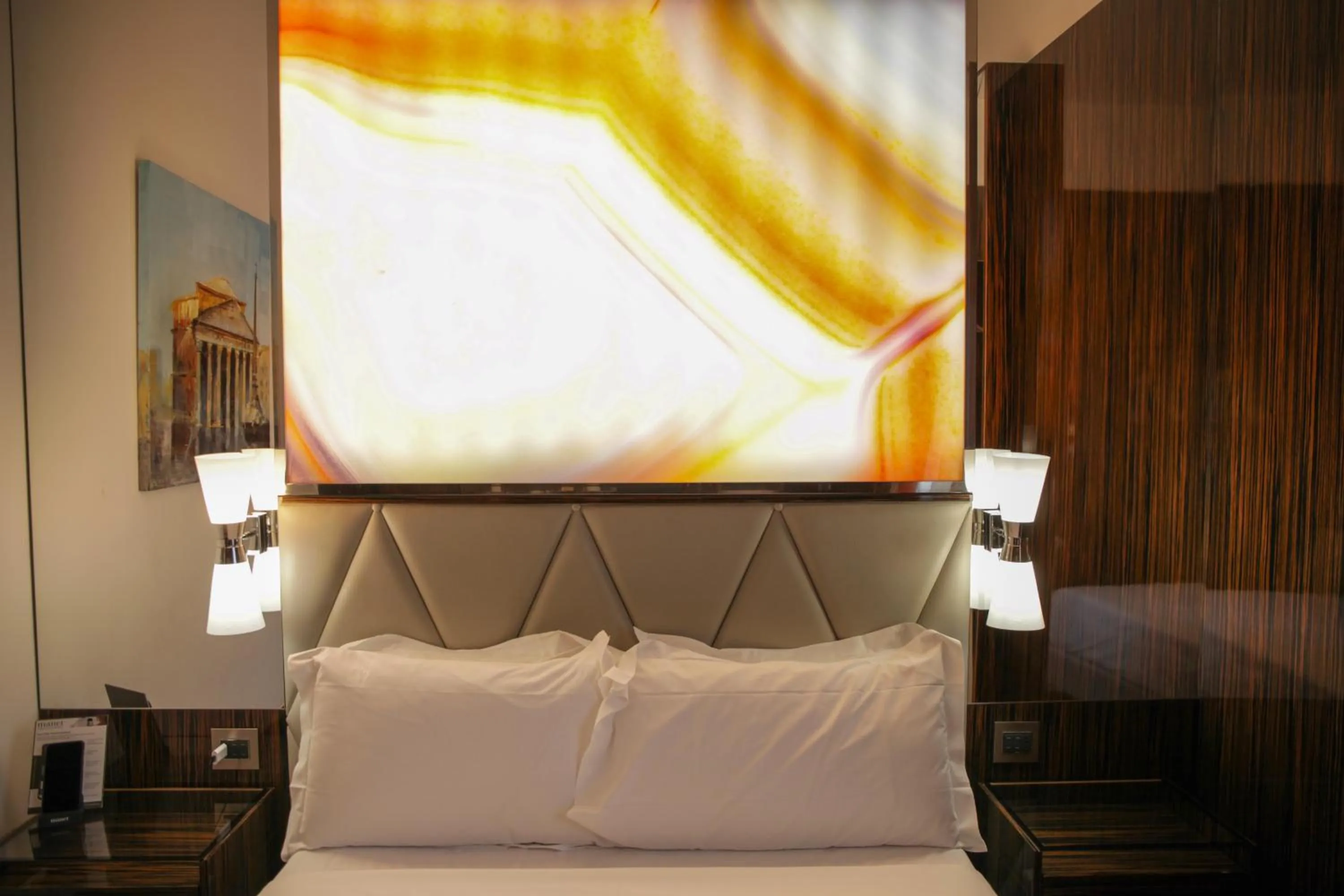 Bed in Le Boutique Hotel