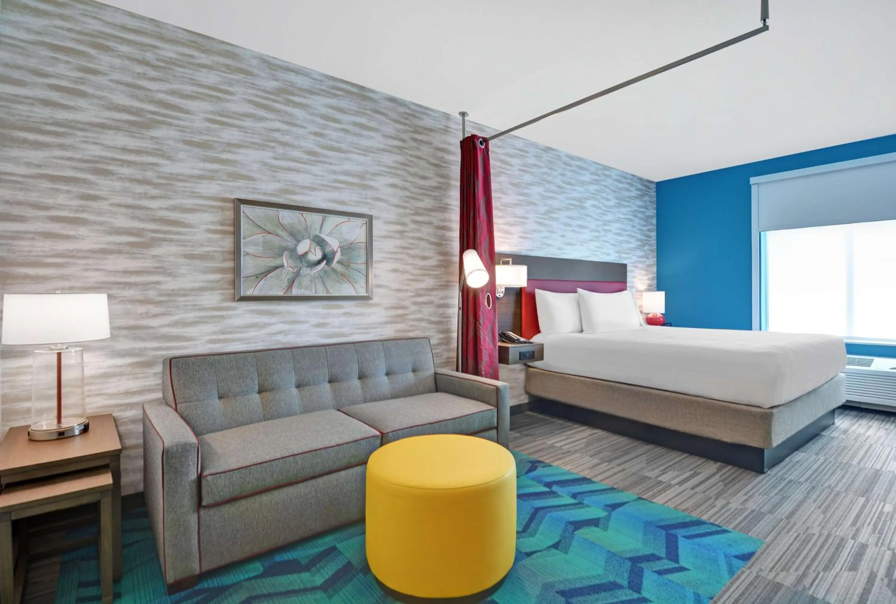 Living room, Bed in Home2 Suites By Hilton Melbourne Viera