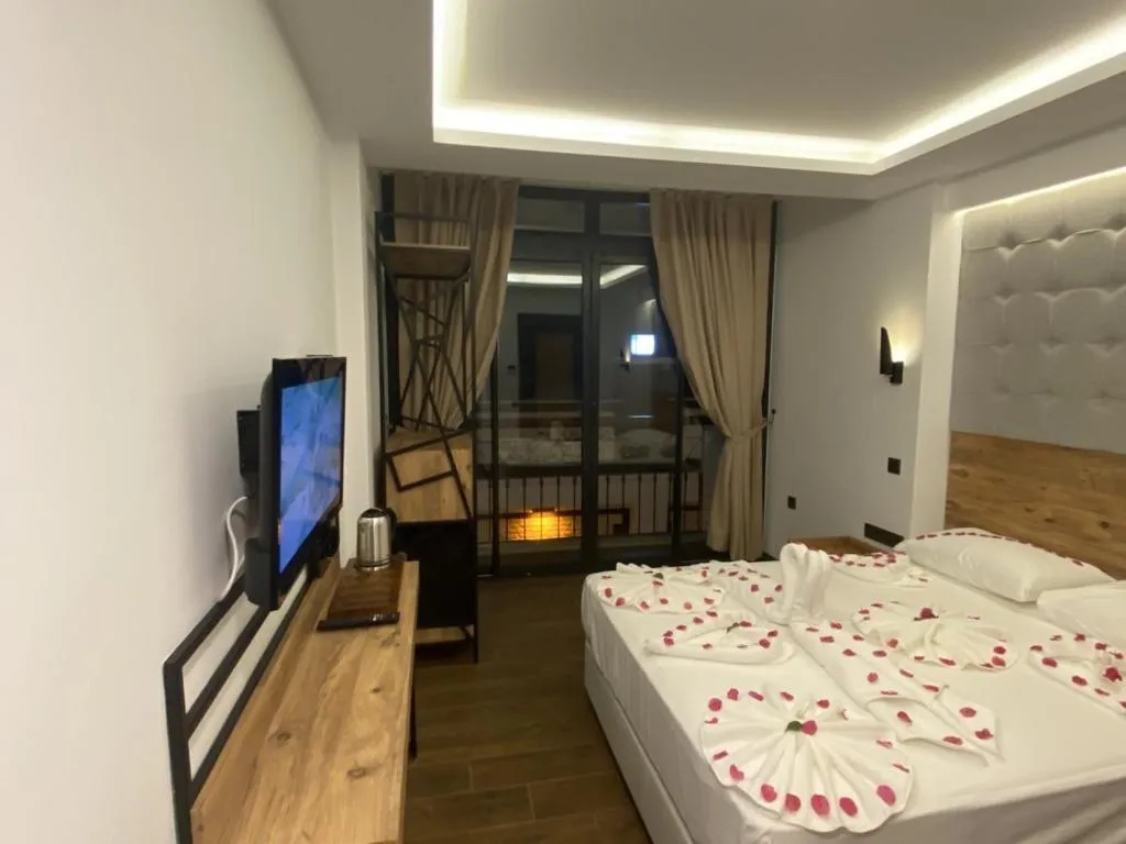 Bed in MİYAS LUXURY HOTEL