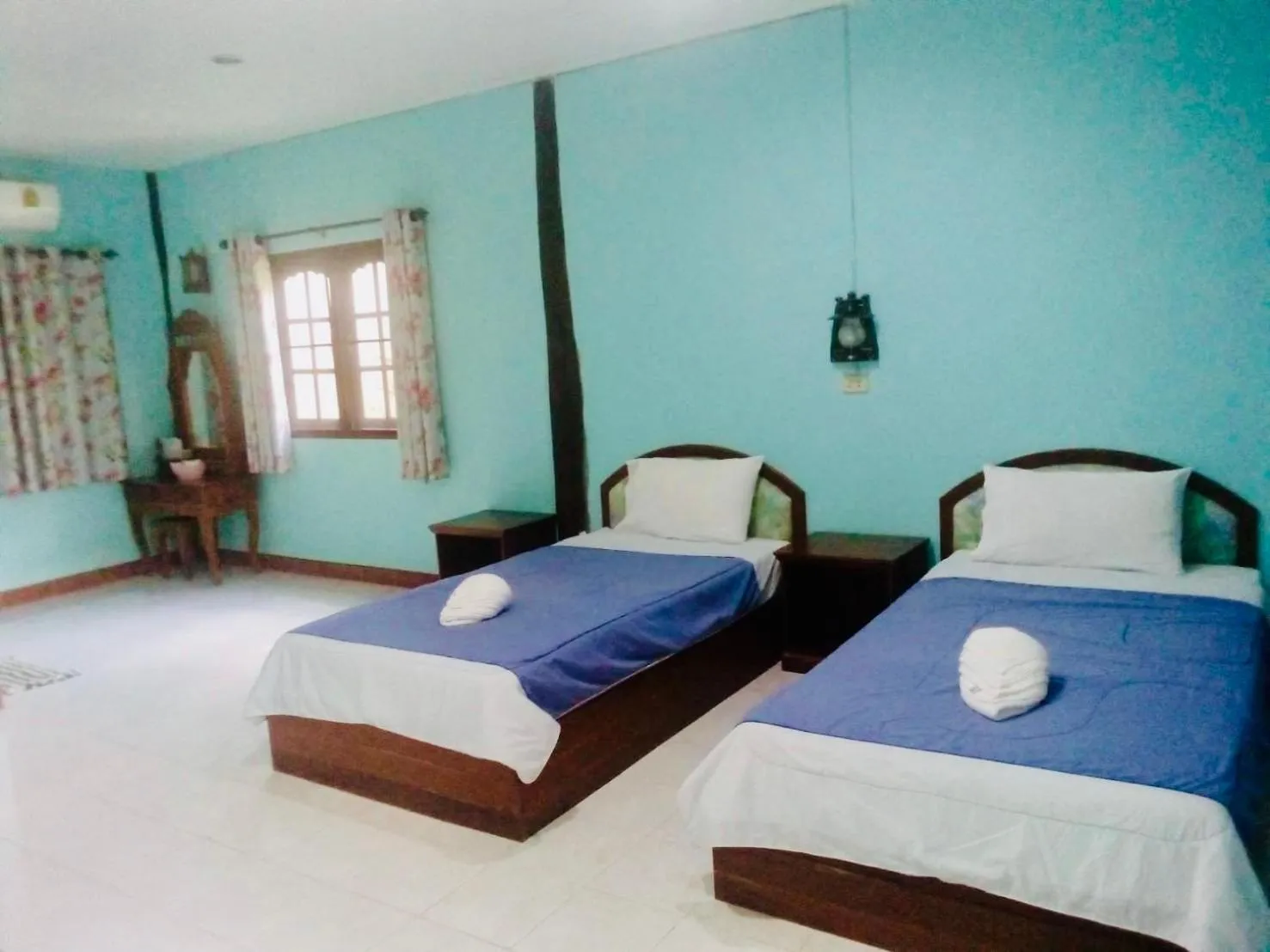 Bed in Baan Pak Rim Kuaen Resort