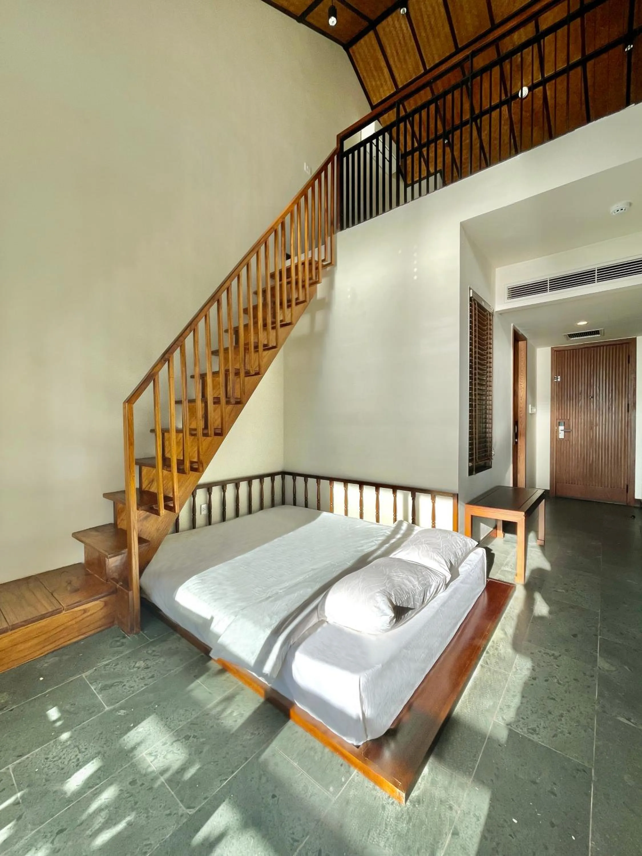 Photo of the whole room, Bed in Nghê Prana Hotel and Spa Hoi An