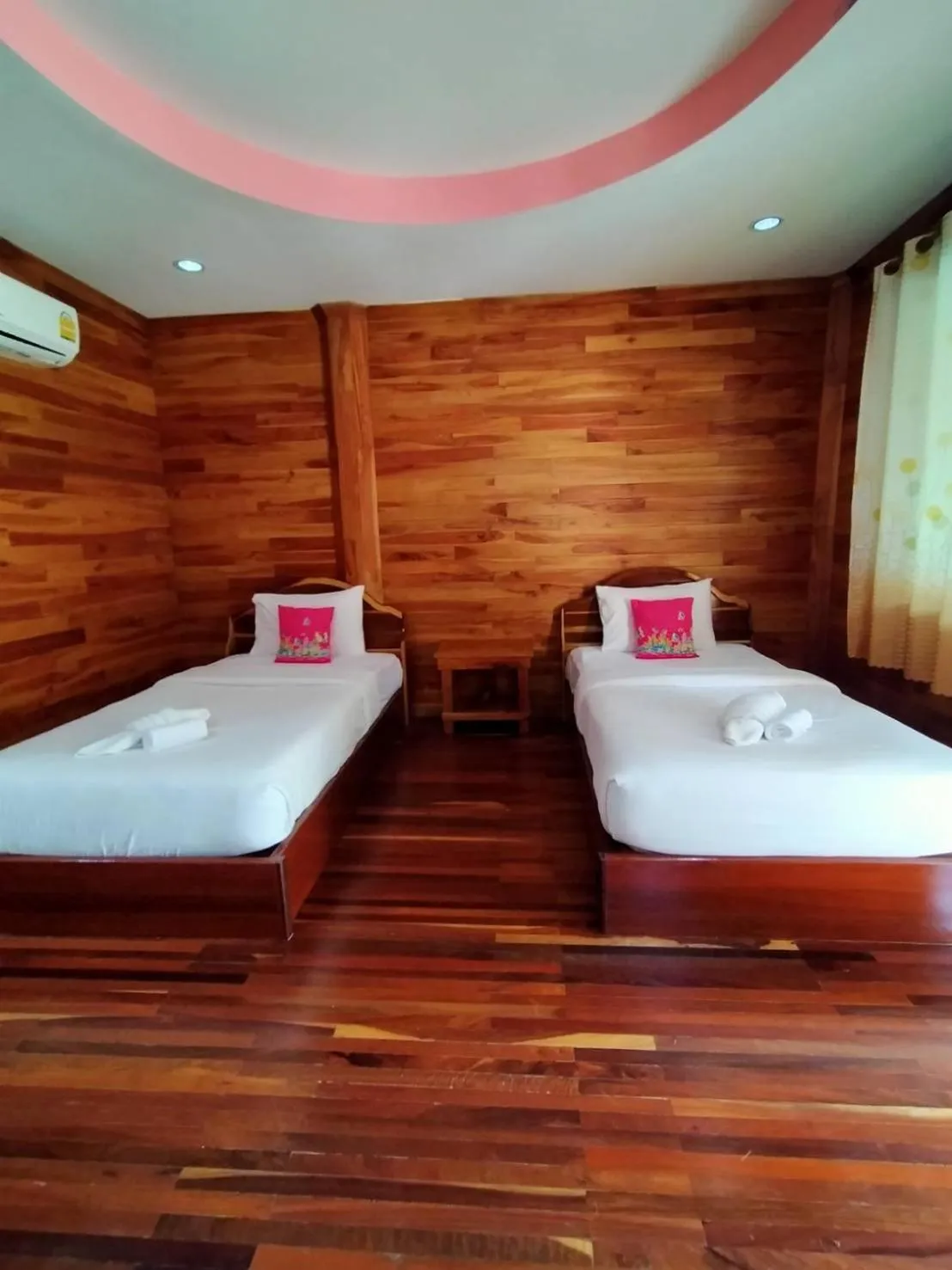 Bed in Palmsuay Resort