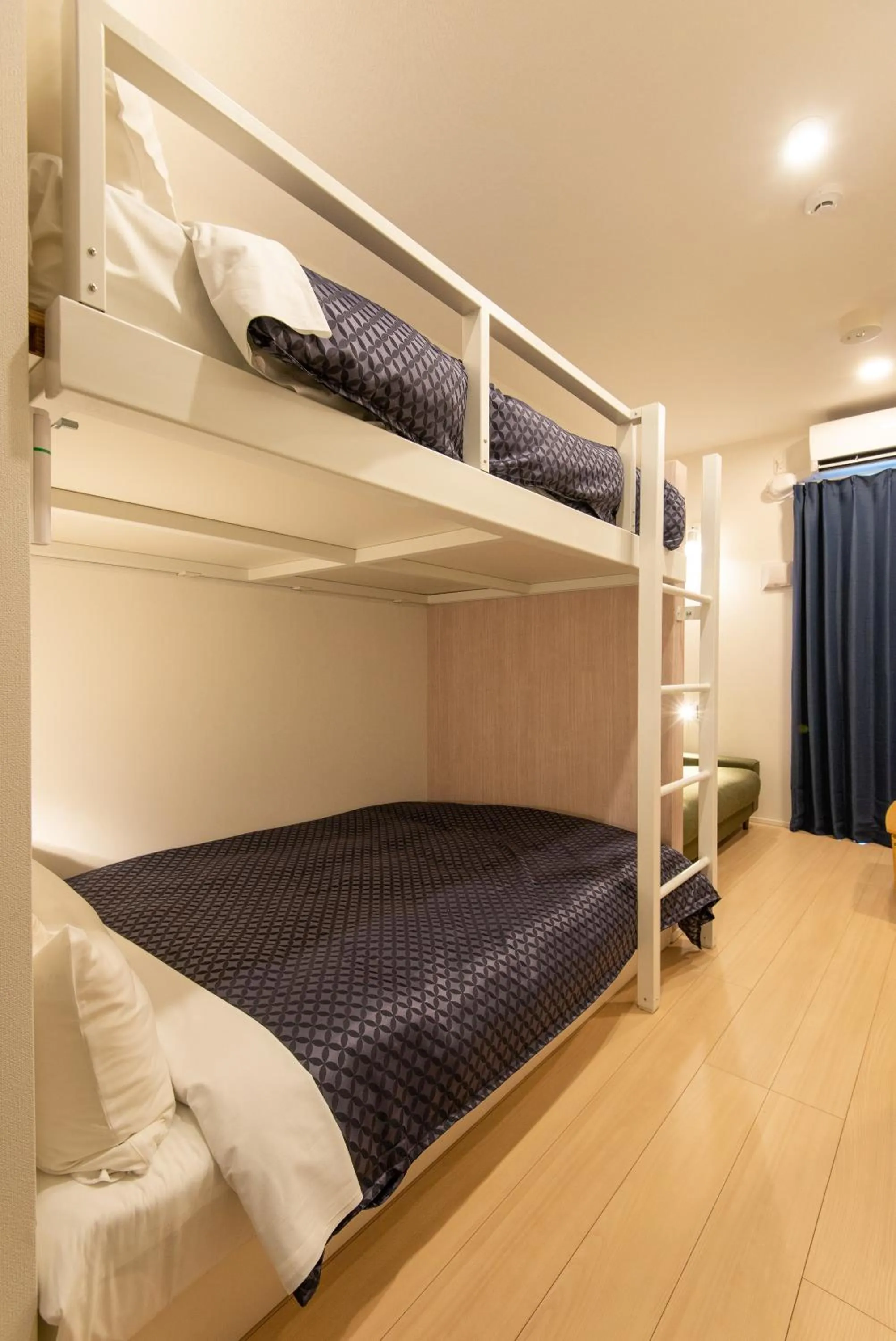 Bed in MK Hotels Nishinakasu