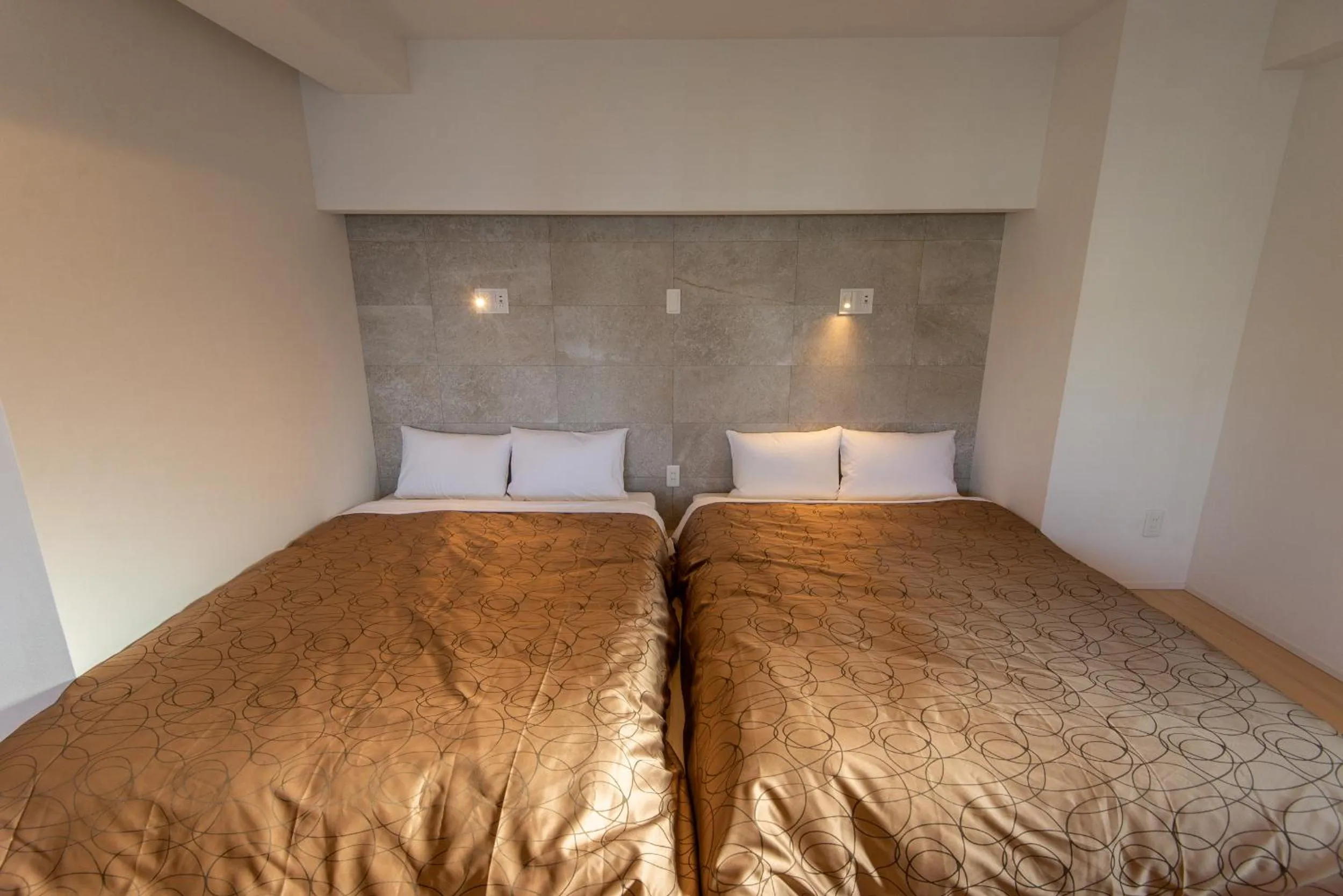 Bed in MK Hotels Nishinakasu