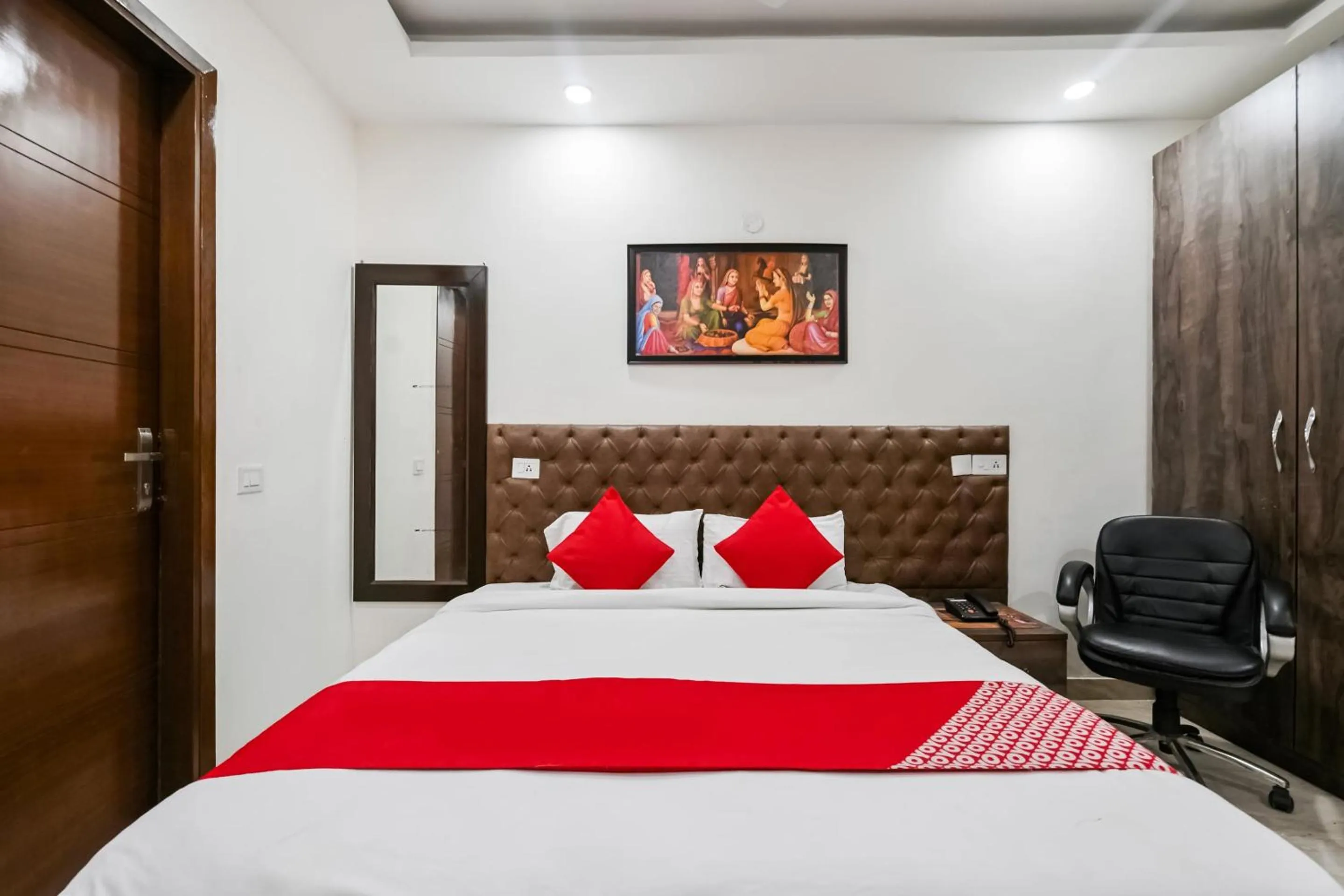 Bedroom in OYO White Rose Wallon Hotel Near Qutab Minar Metro Station