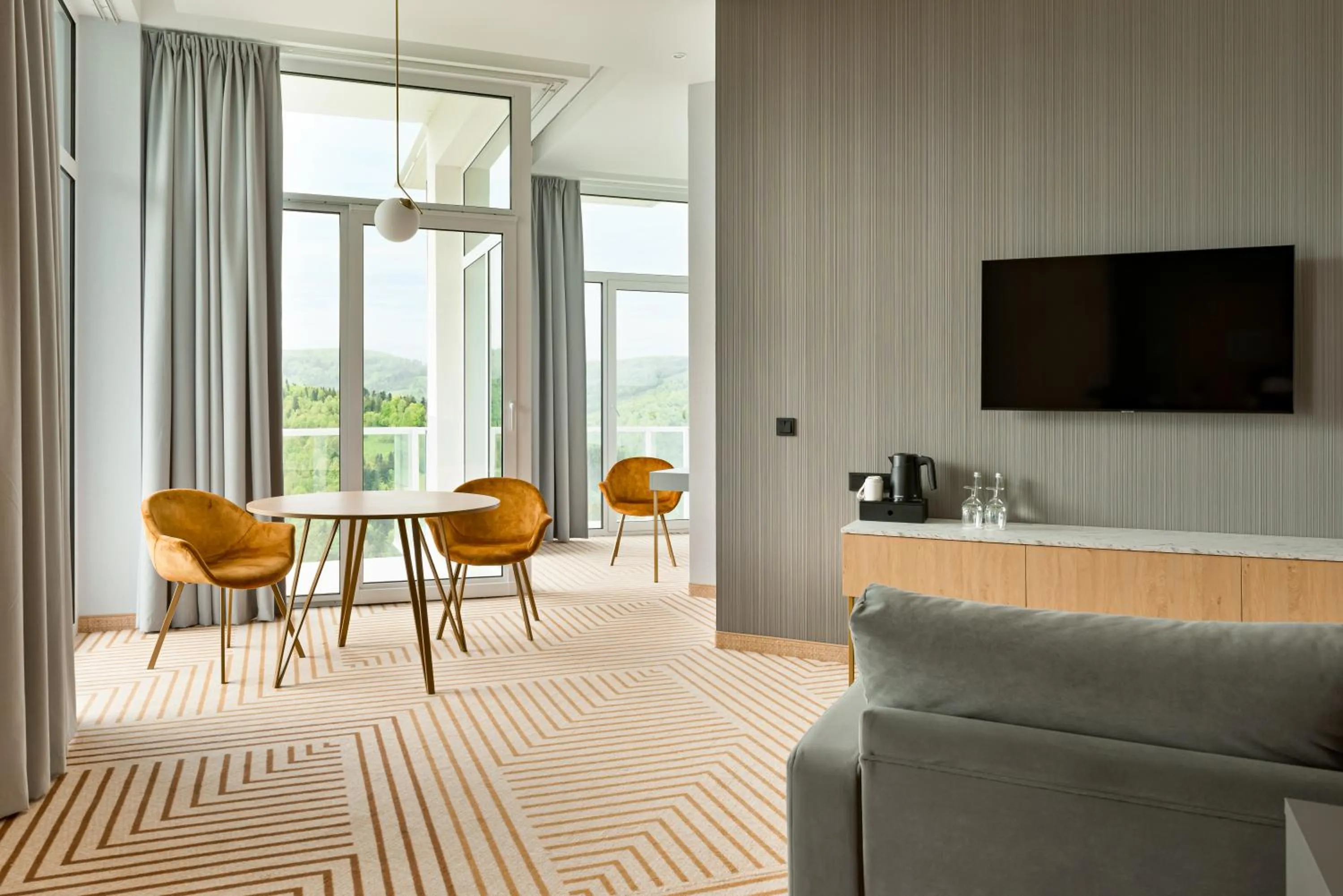 Communal lounge/ TV room in Crystal Mountain Hotel Wisła