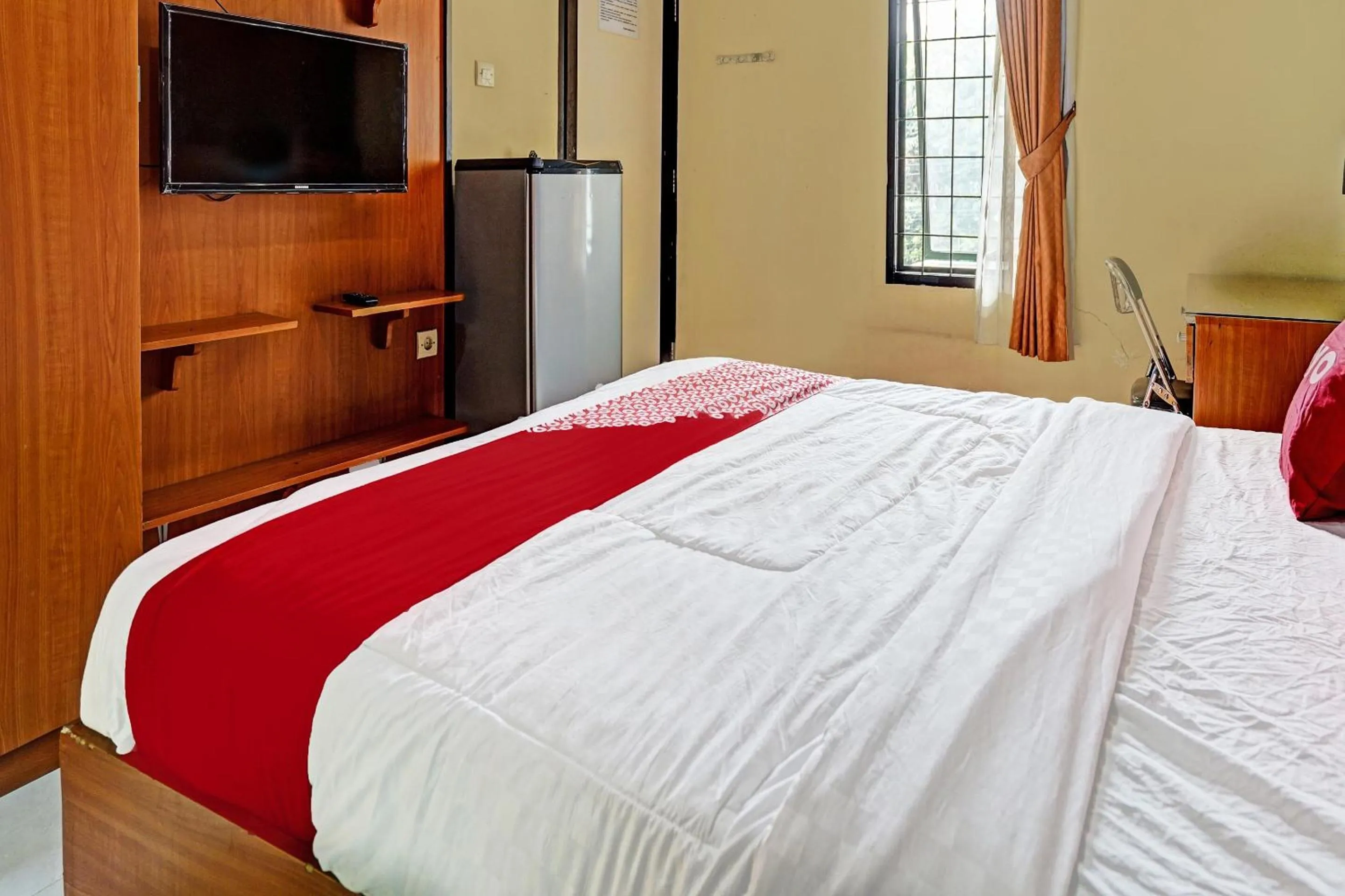 Bedroom in OYO 91547 Graha Hermawan Guest House Syariah