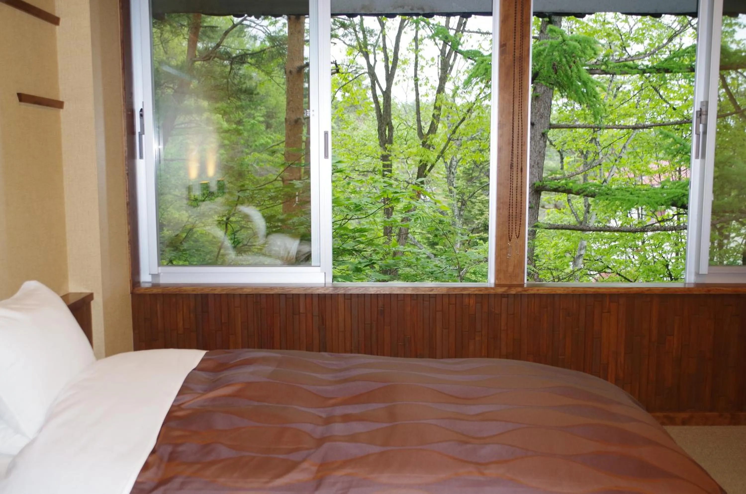 Bed in Kusatsu Skyland Hotel