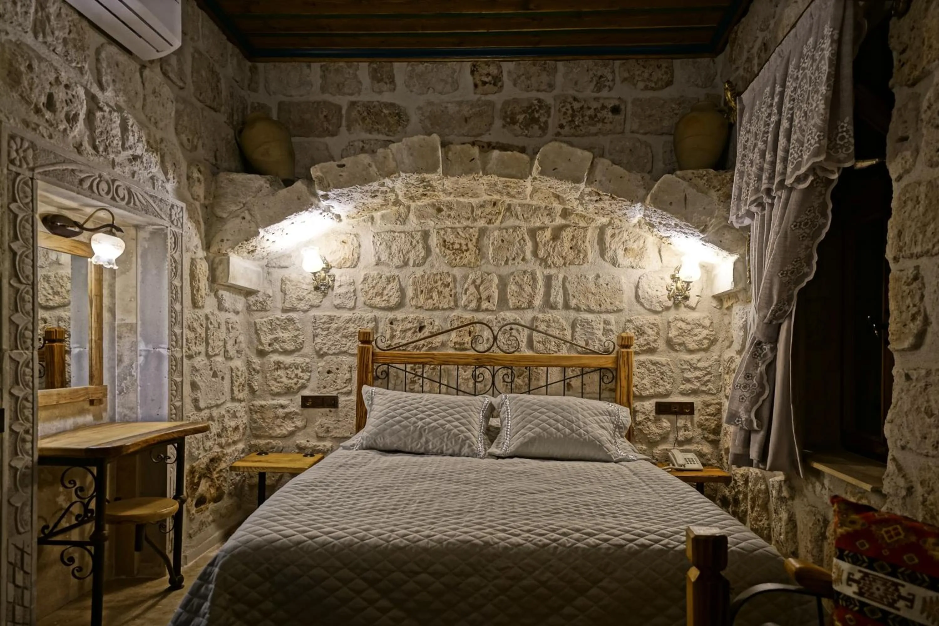 Bed in Cappadocia Cave Lodge