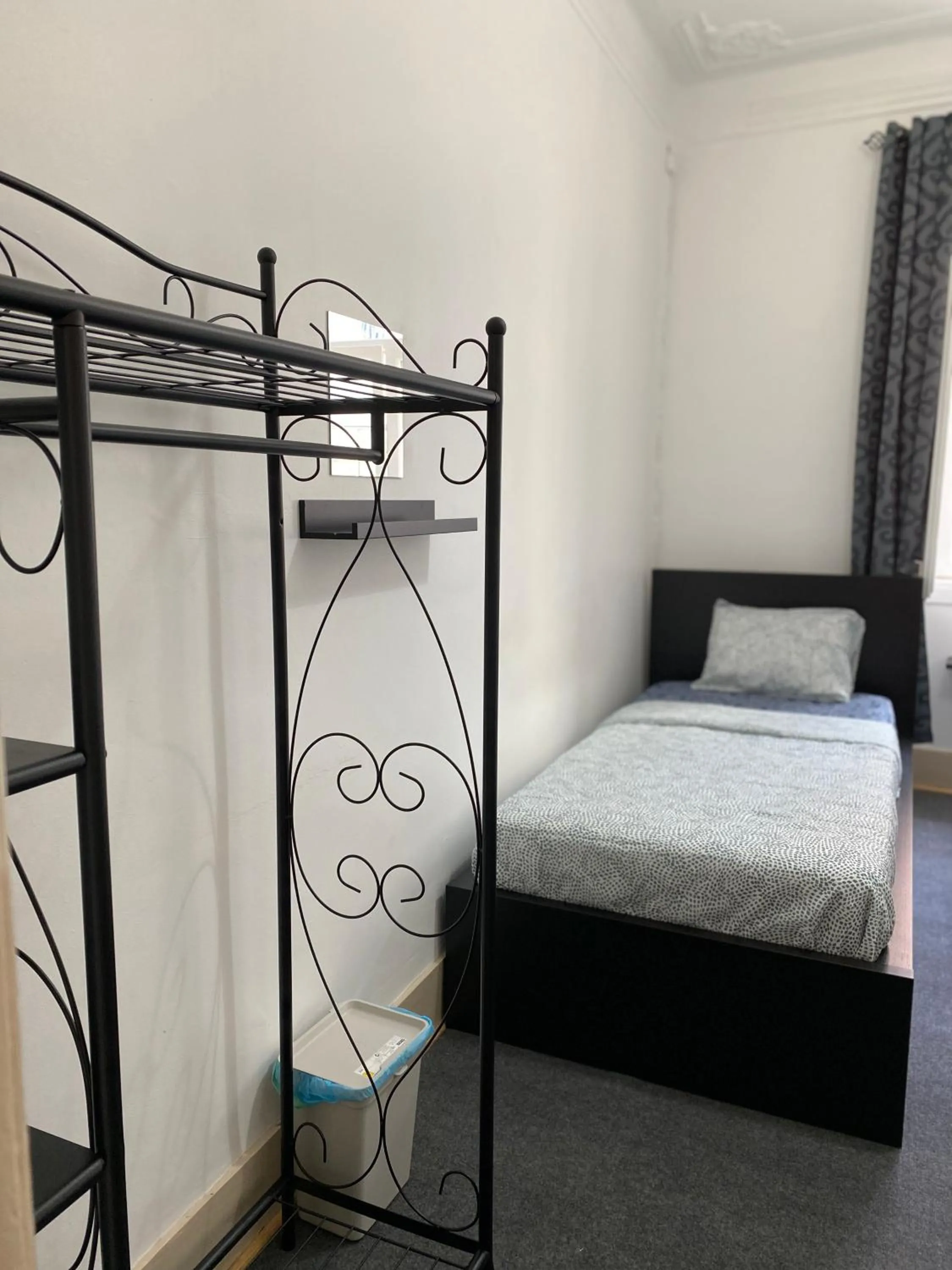 Bed in Sri-Indo Guest House