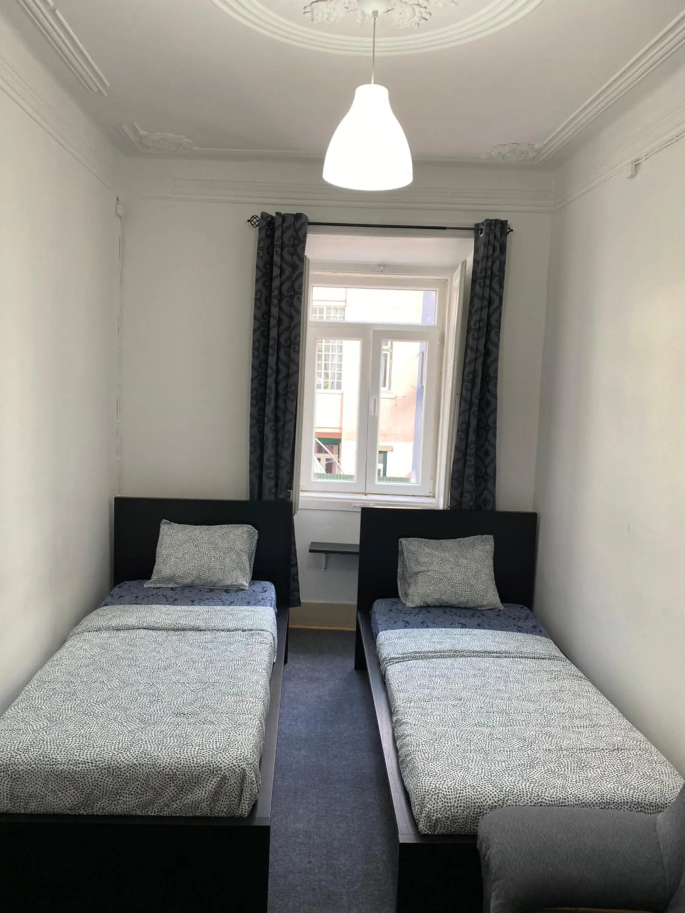 Bed in Sri-Indo Guest House