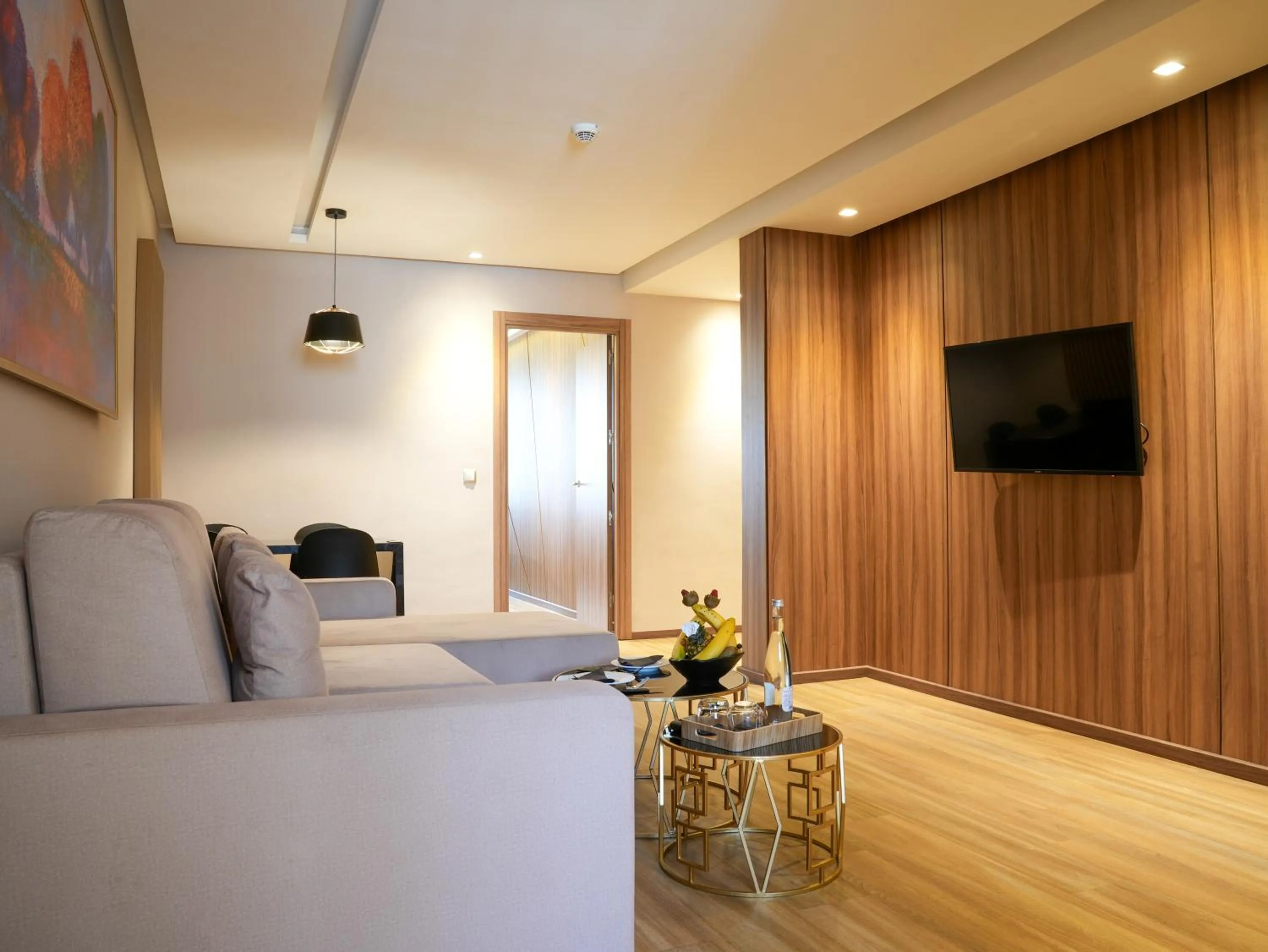 Bed in First Suites Hôtel