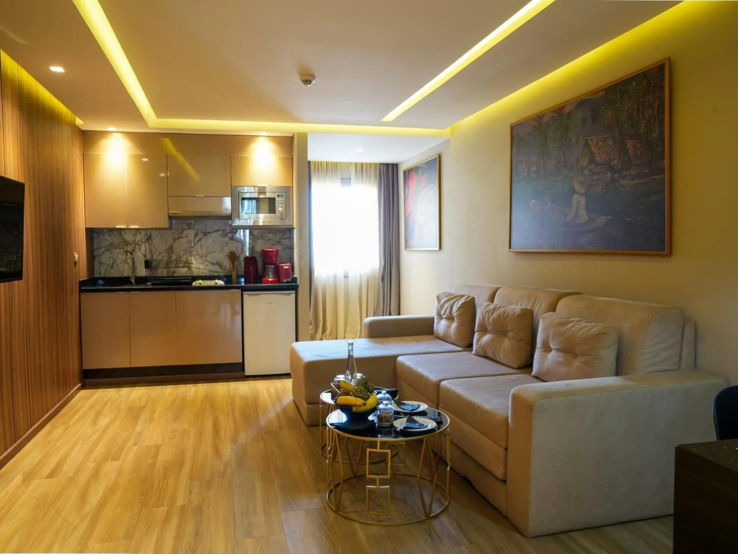 Kitchen or kitchenette in First Suites Hôtel