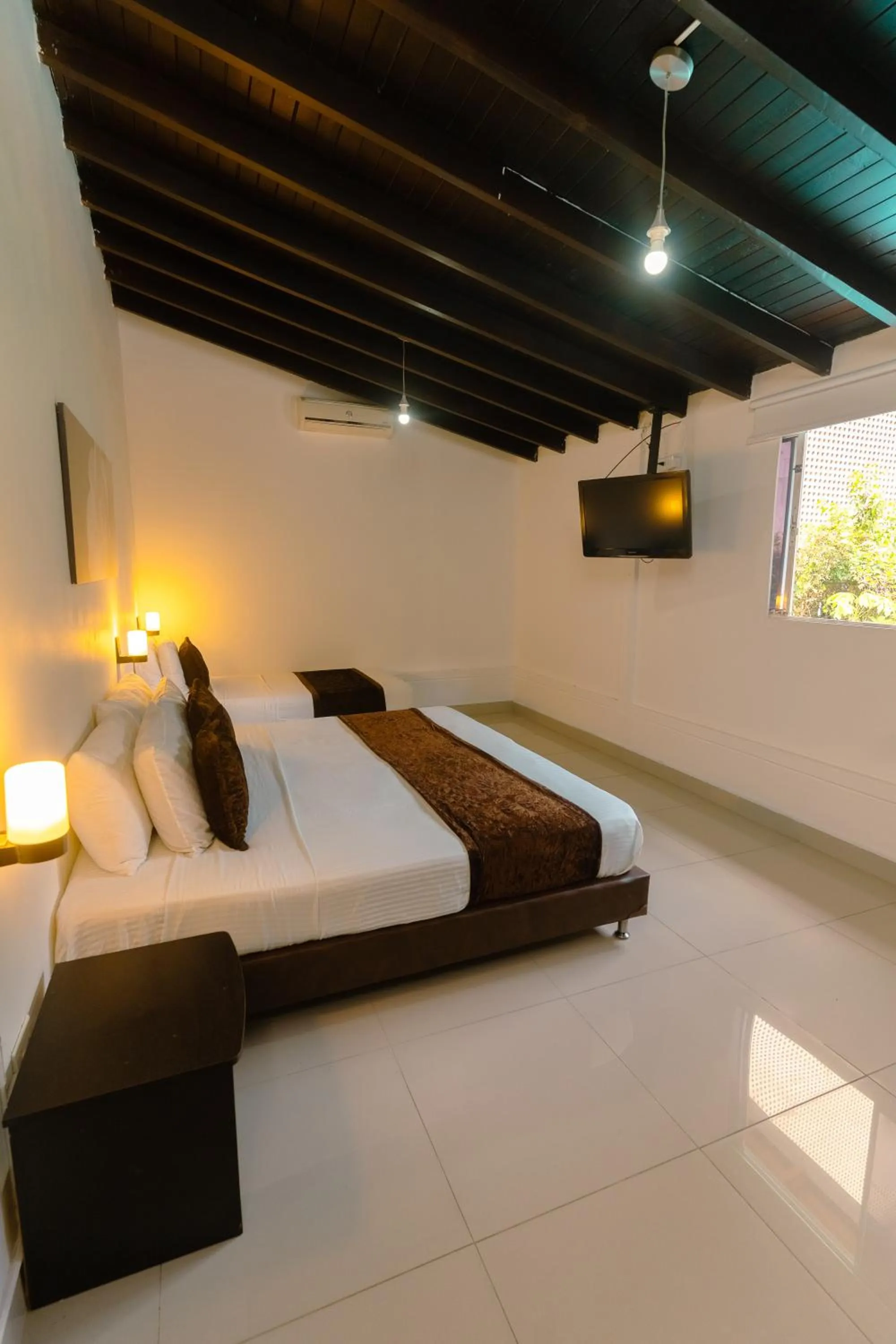 Photo of the whole room, Bed in Hotel Boutique las Rosas 5 G