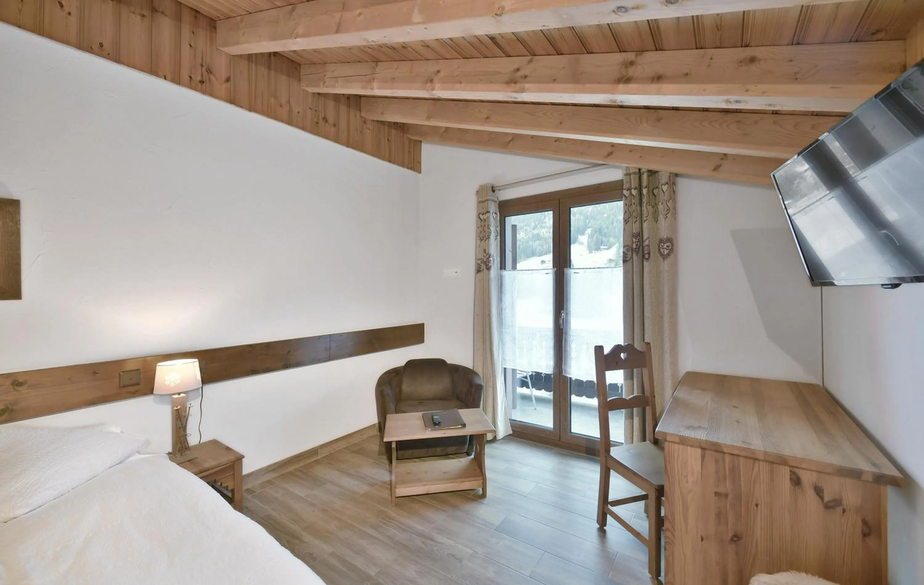 Bed in Hôtel Le Chamois