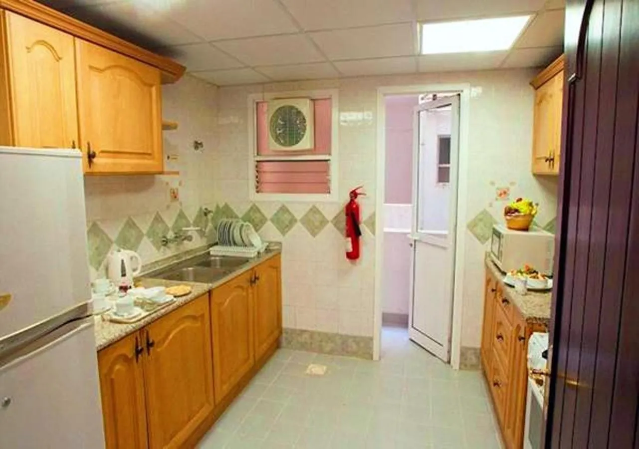 kitchen in Safeer Hotel Suites