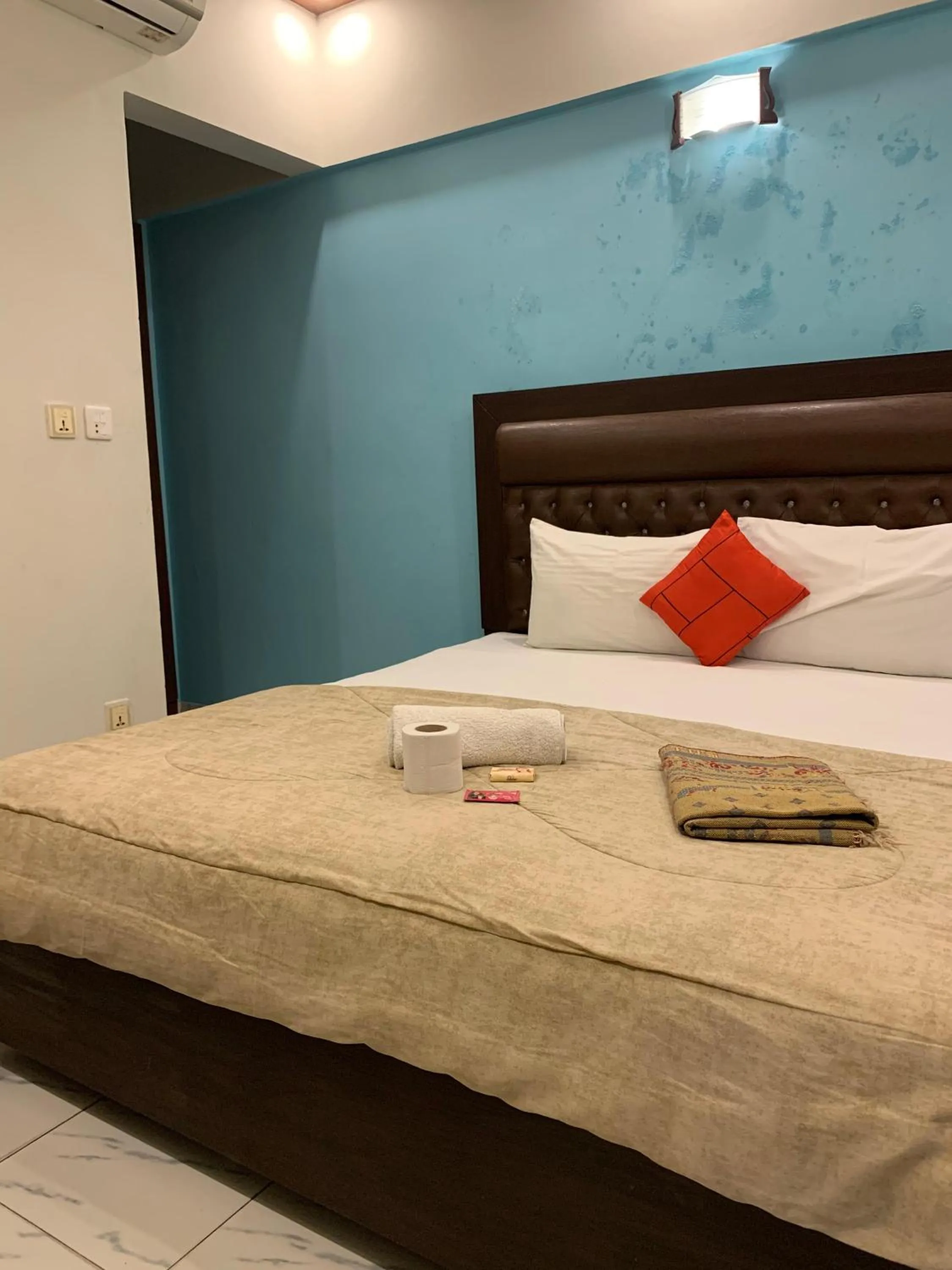 Bed in GOHO Rooms Badar