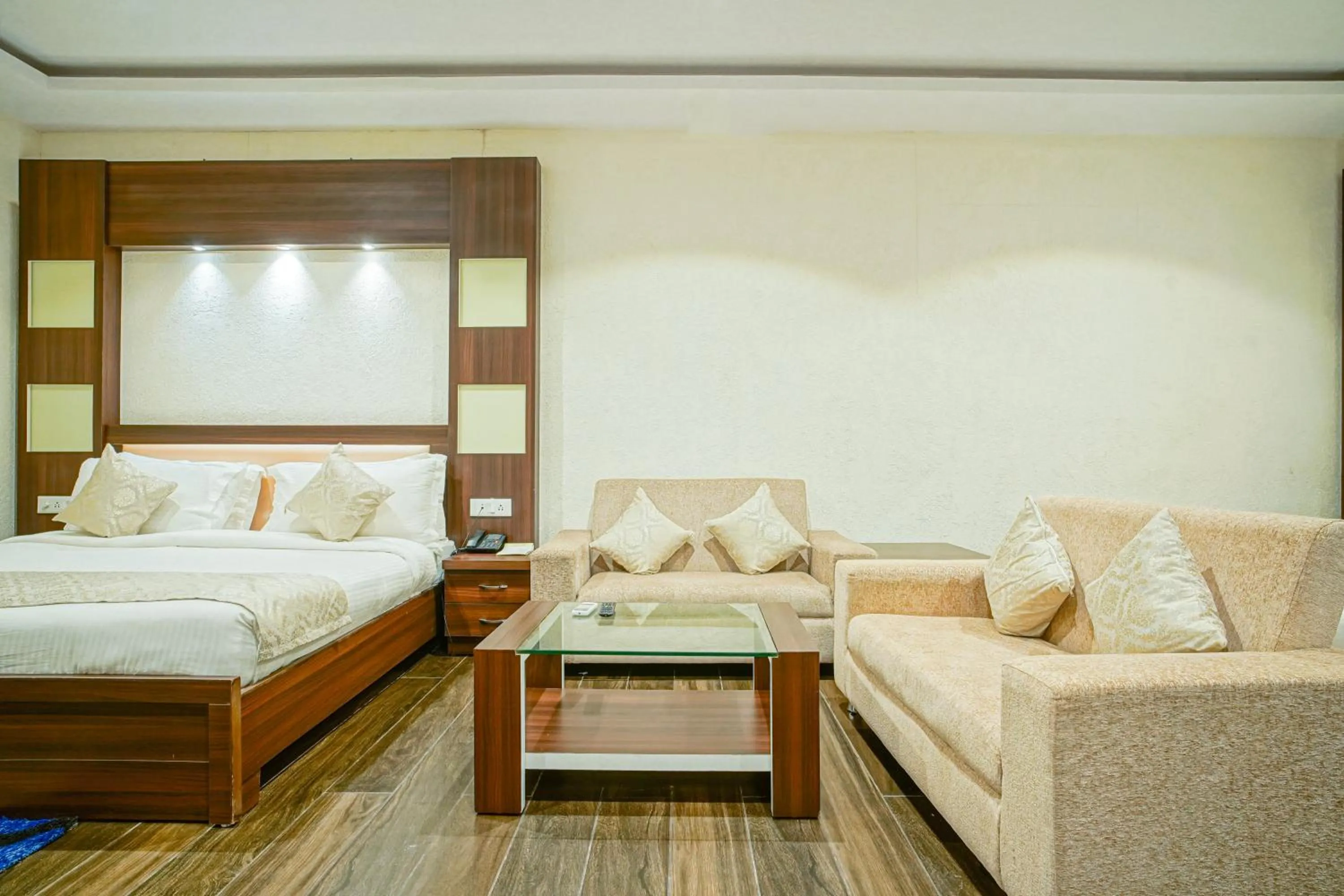 Bed in The Grand Shiva Resort and Spa