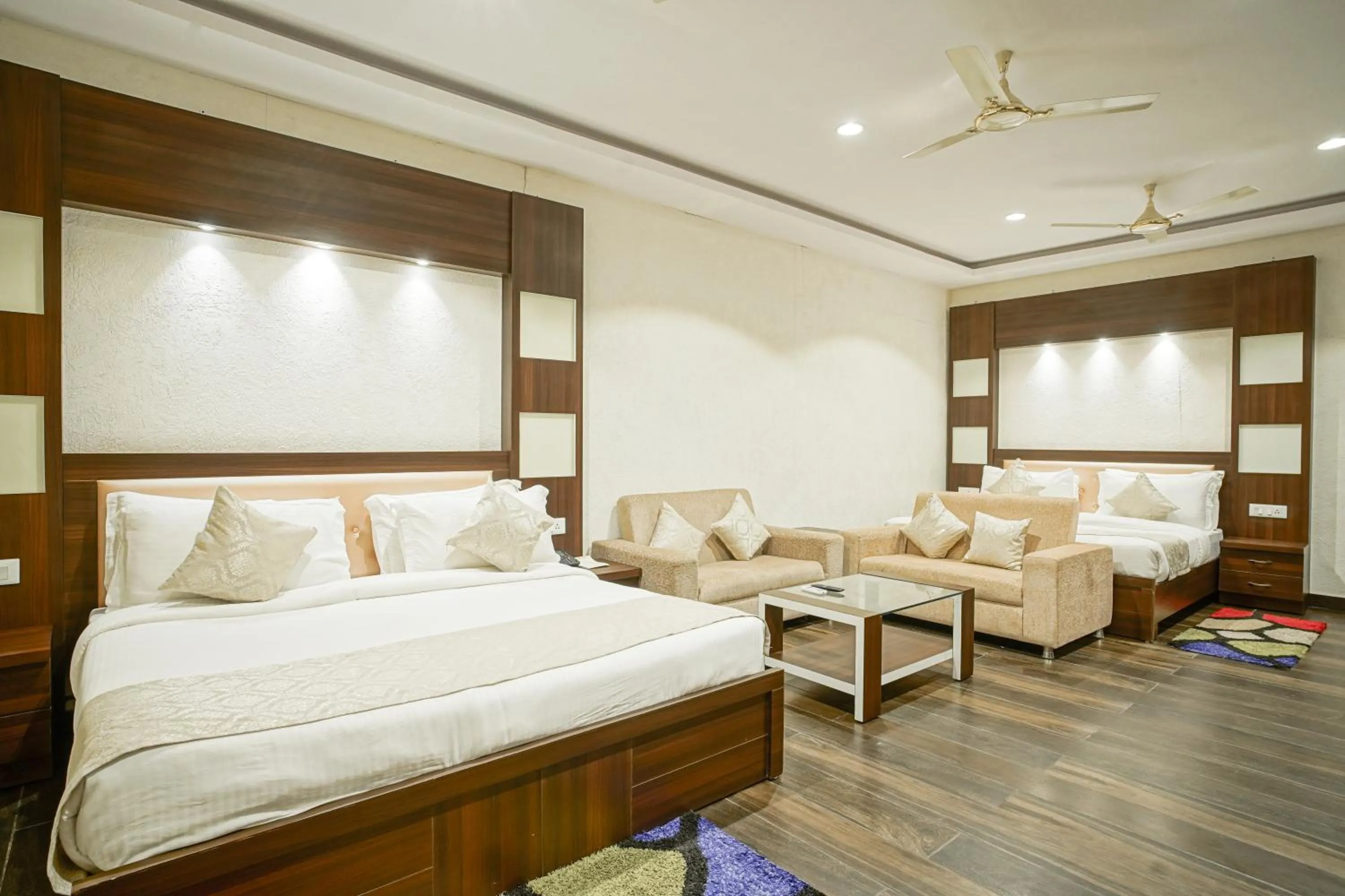 Bed in The Grand Shiva Resort and Spa