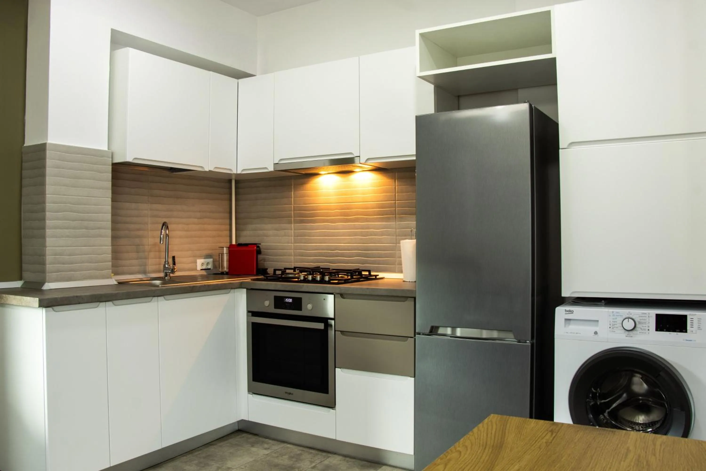Kitchen or kitchenette in Clement Apartments