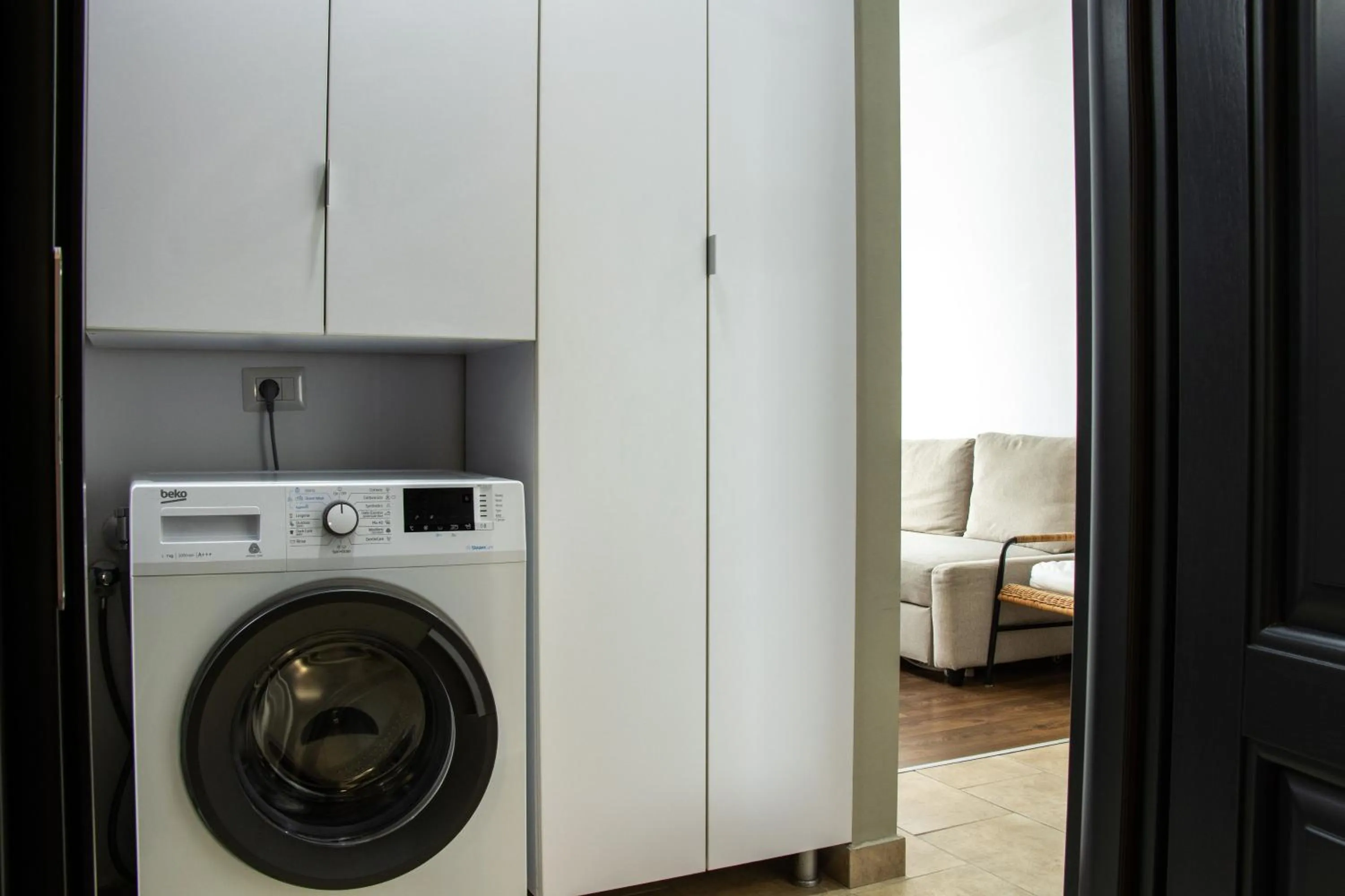 washing machine in Clement Apartments
