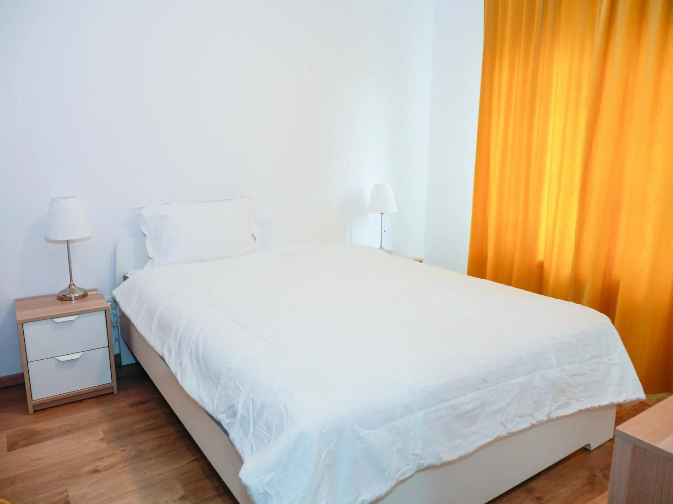 Bed in Clement Apartments