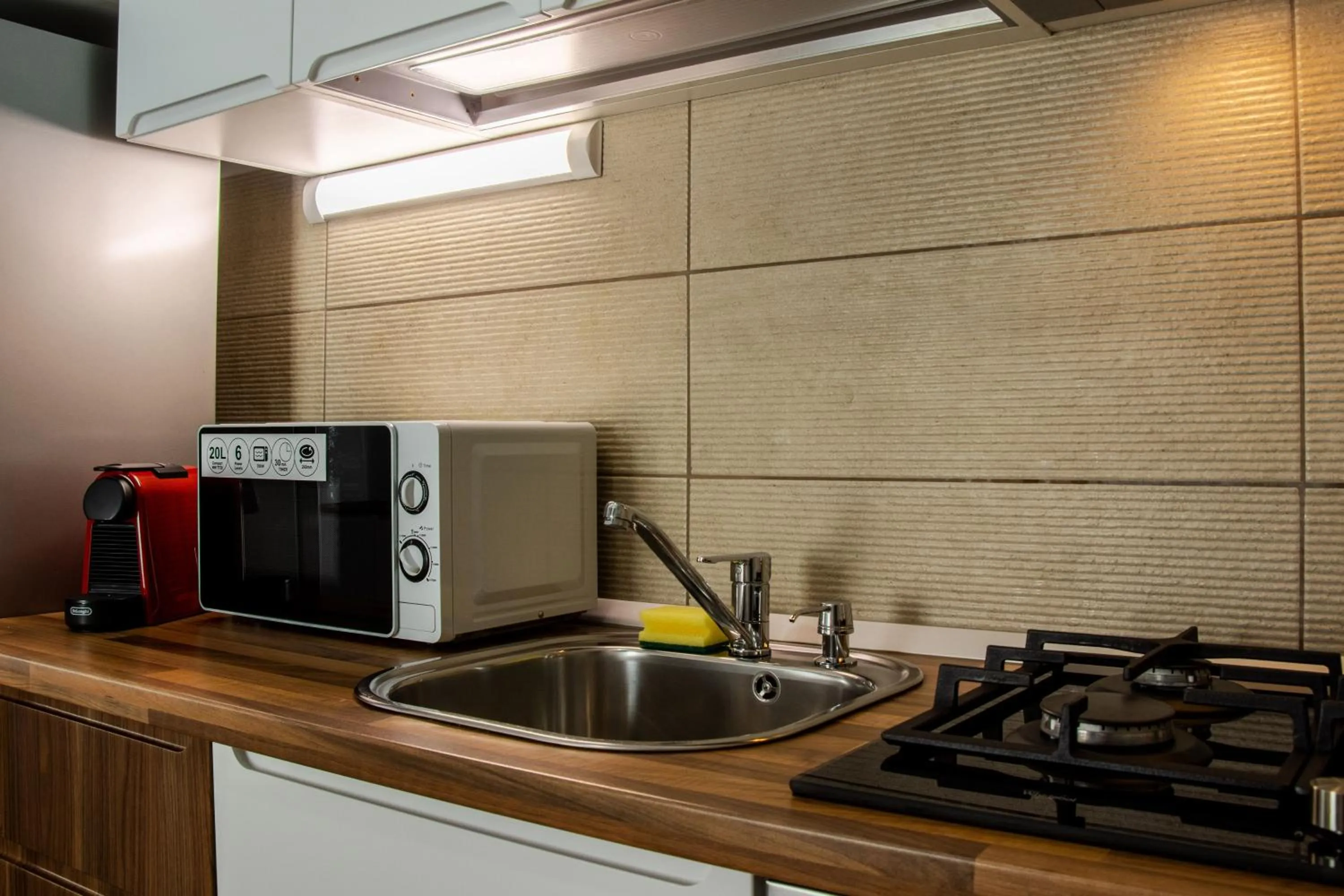 Kitchen or kitchenette in Clement Apartments