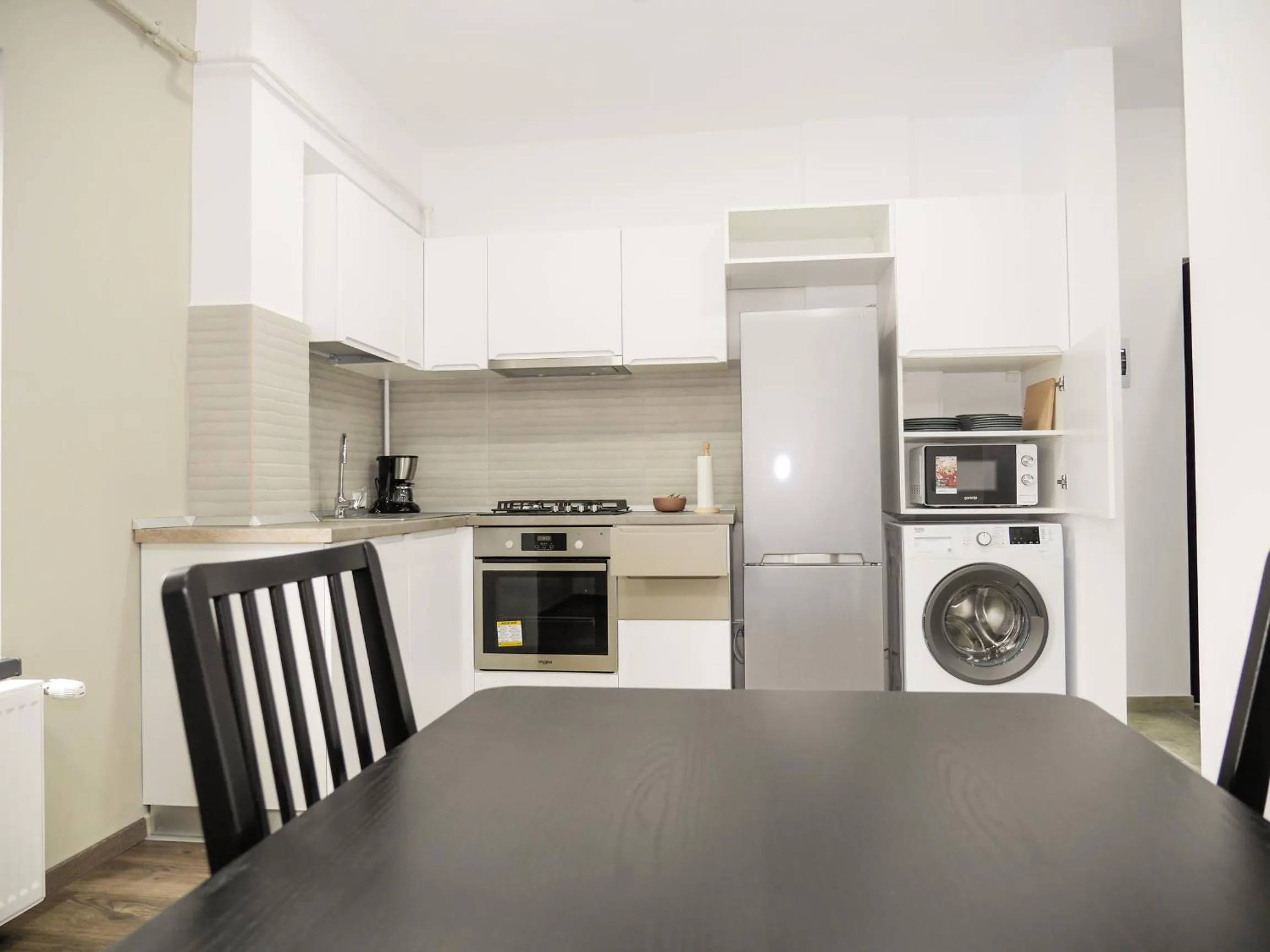 Kitchen or kitchenette in Clement Apartments