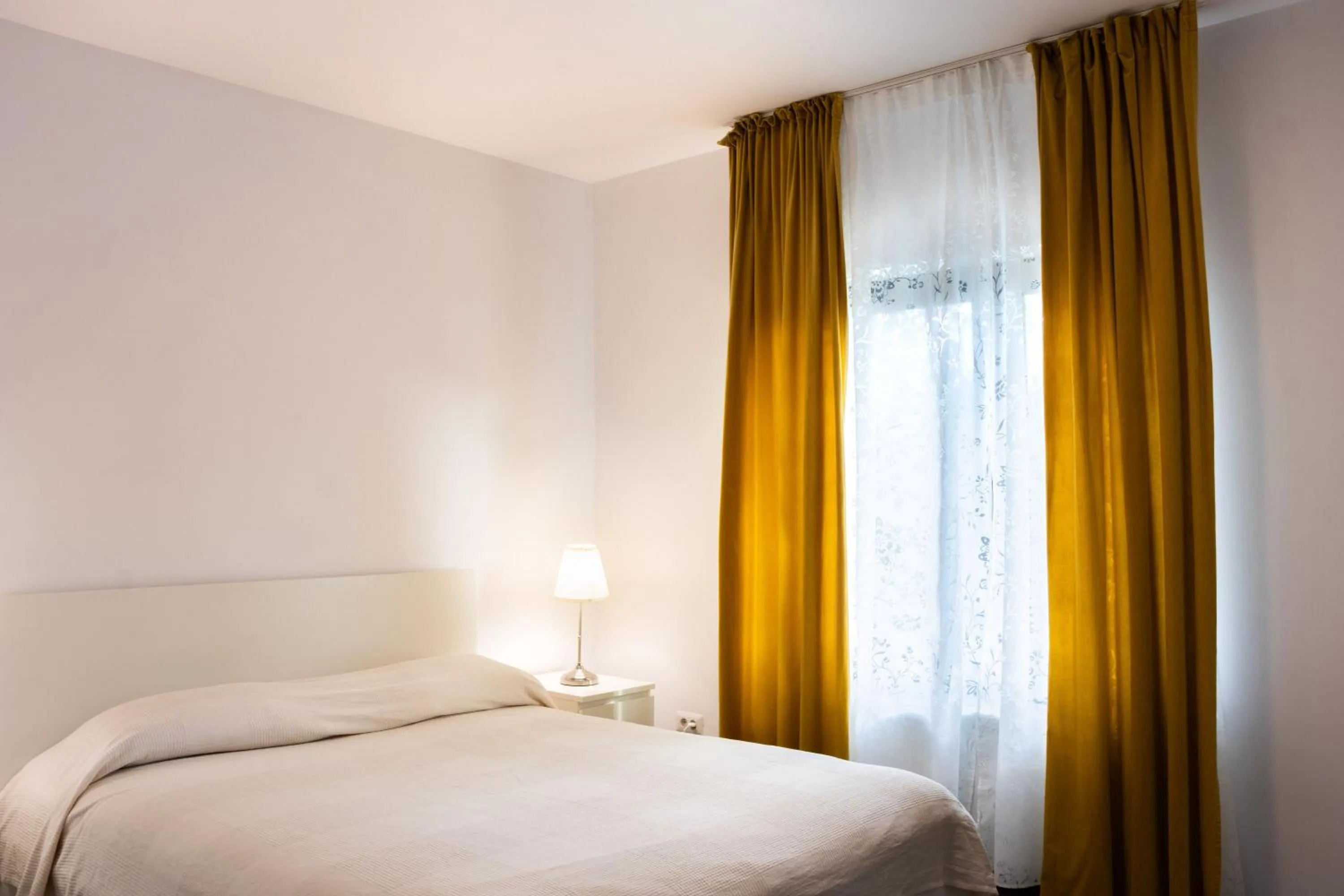 Bed in Clement Apartments