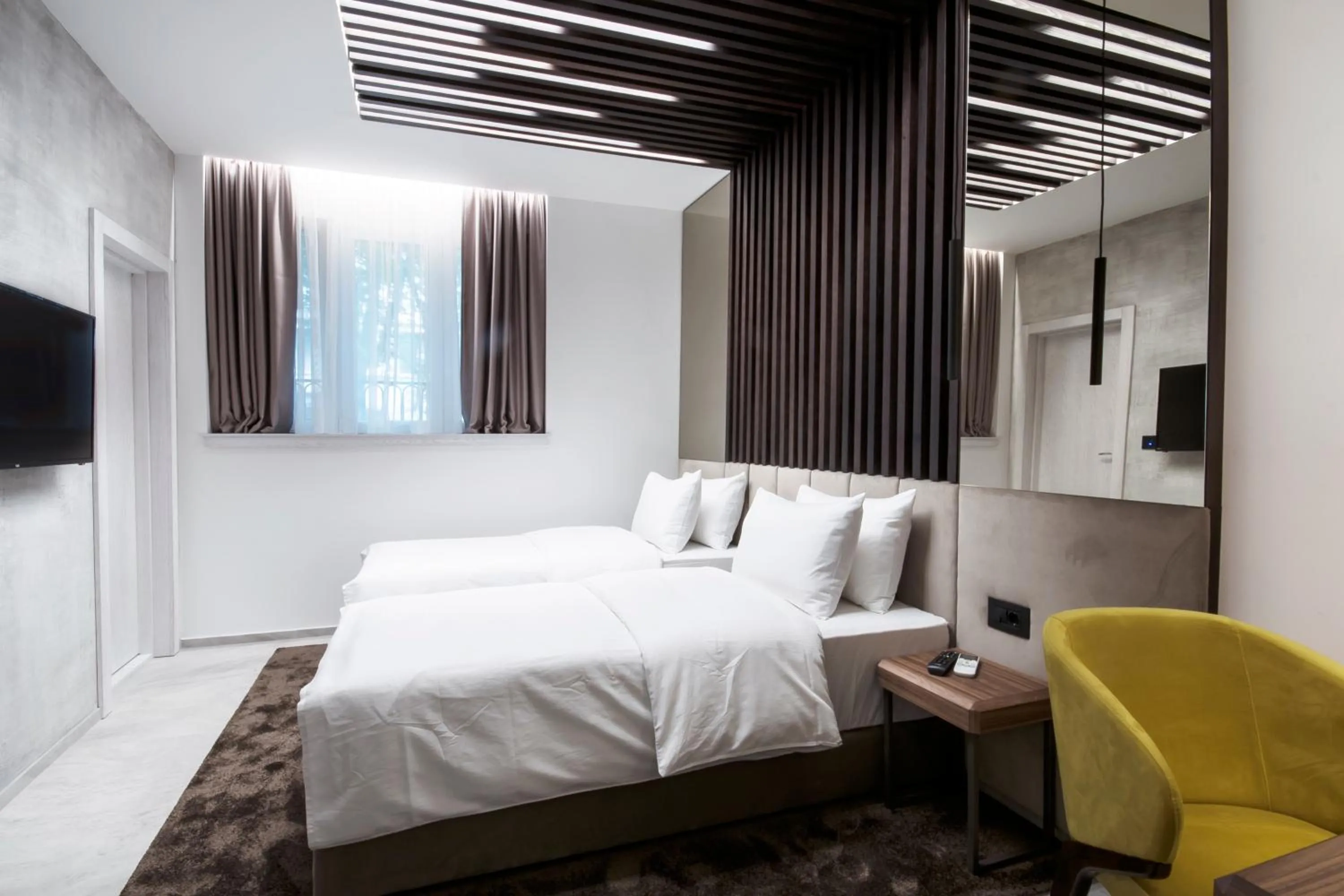 Bed in The Location Hotel