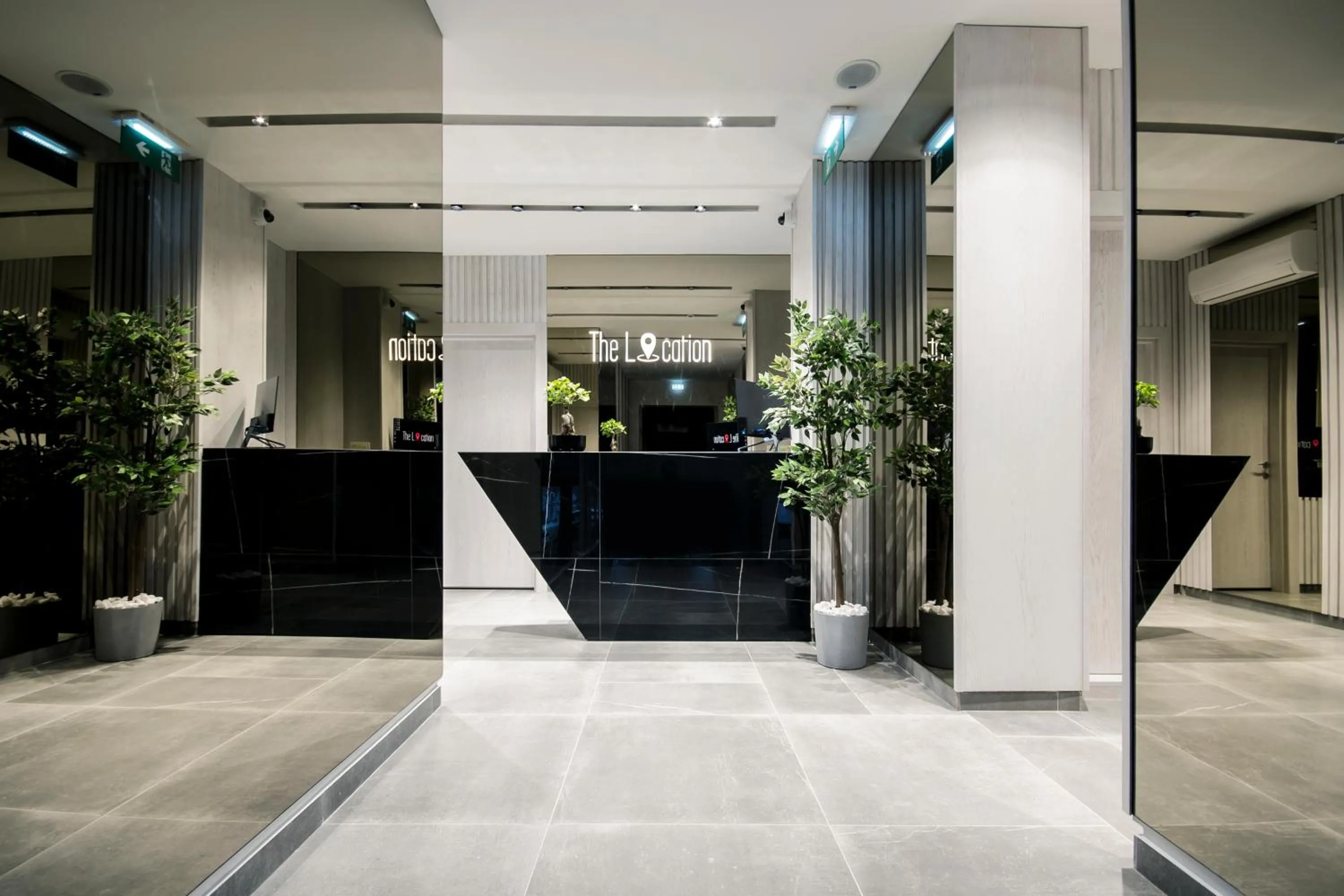 Lobby or reception in The Location Hotel