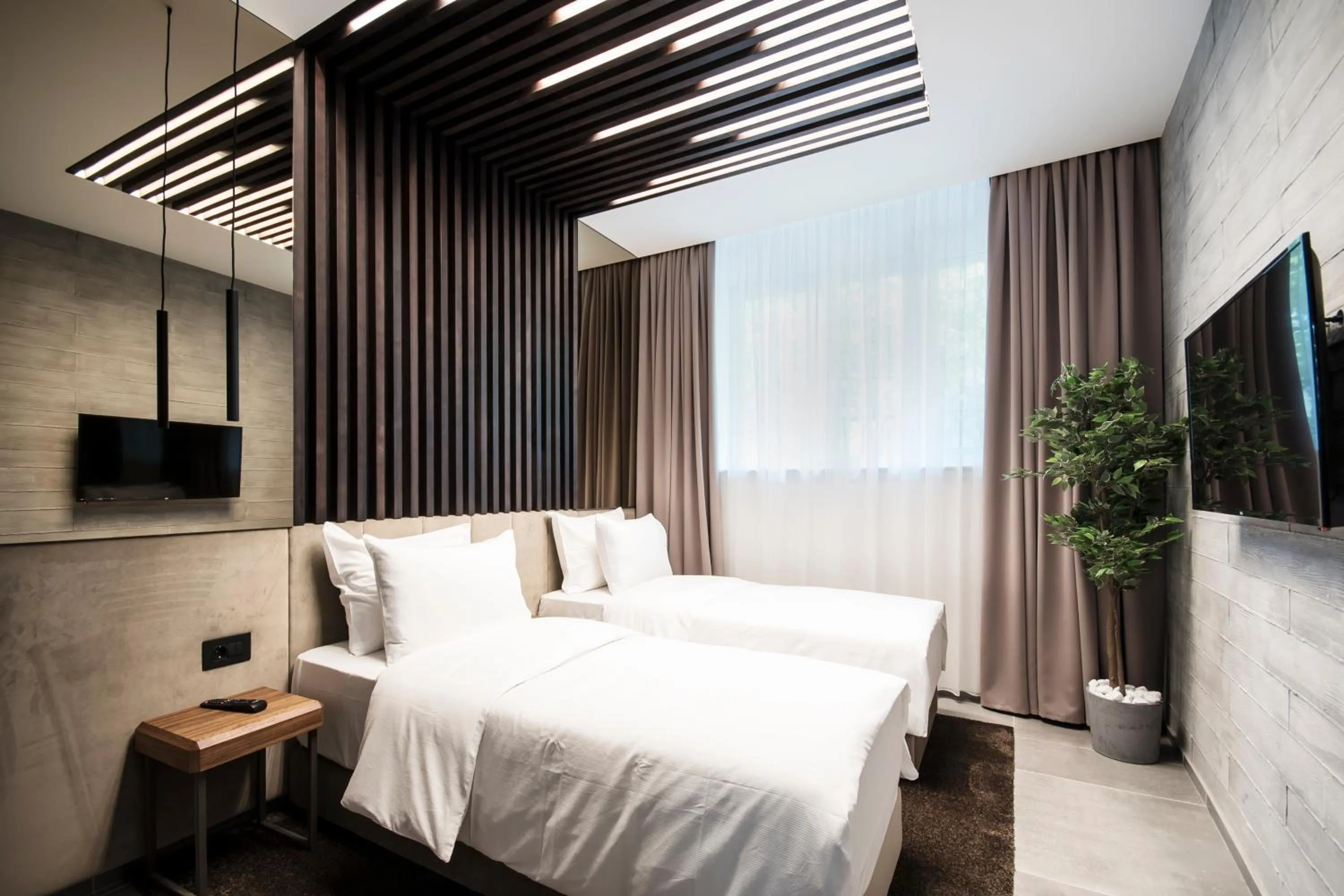 Bedroom, Bed in The Location Hotel