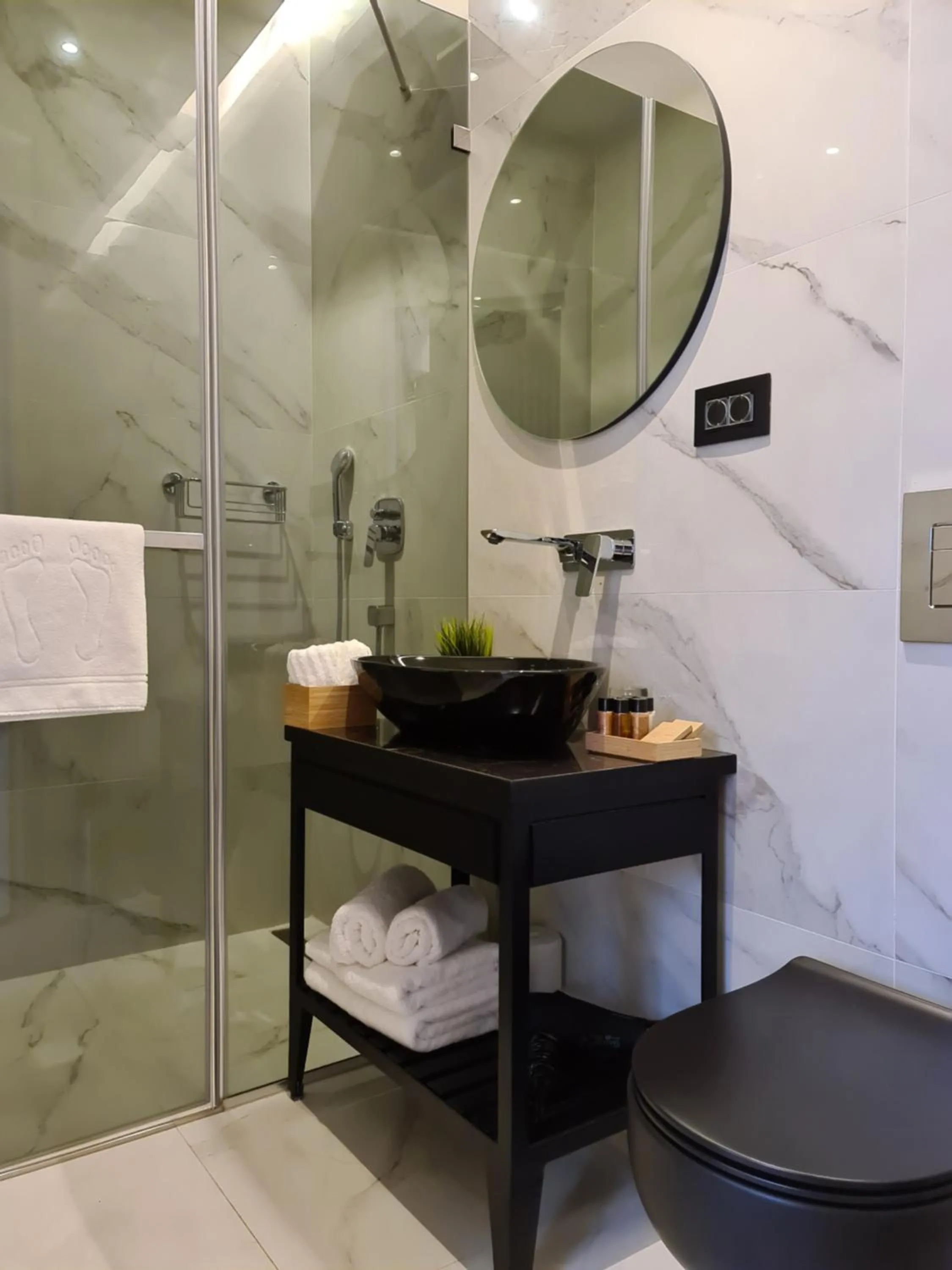 Bathroom in The Location Hotel