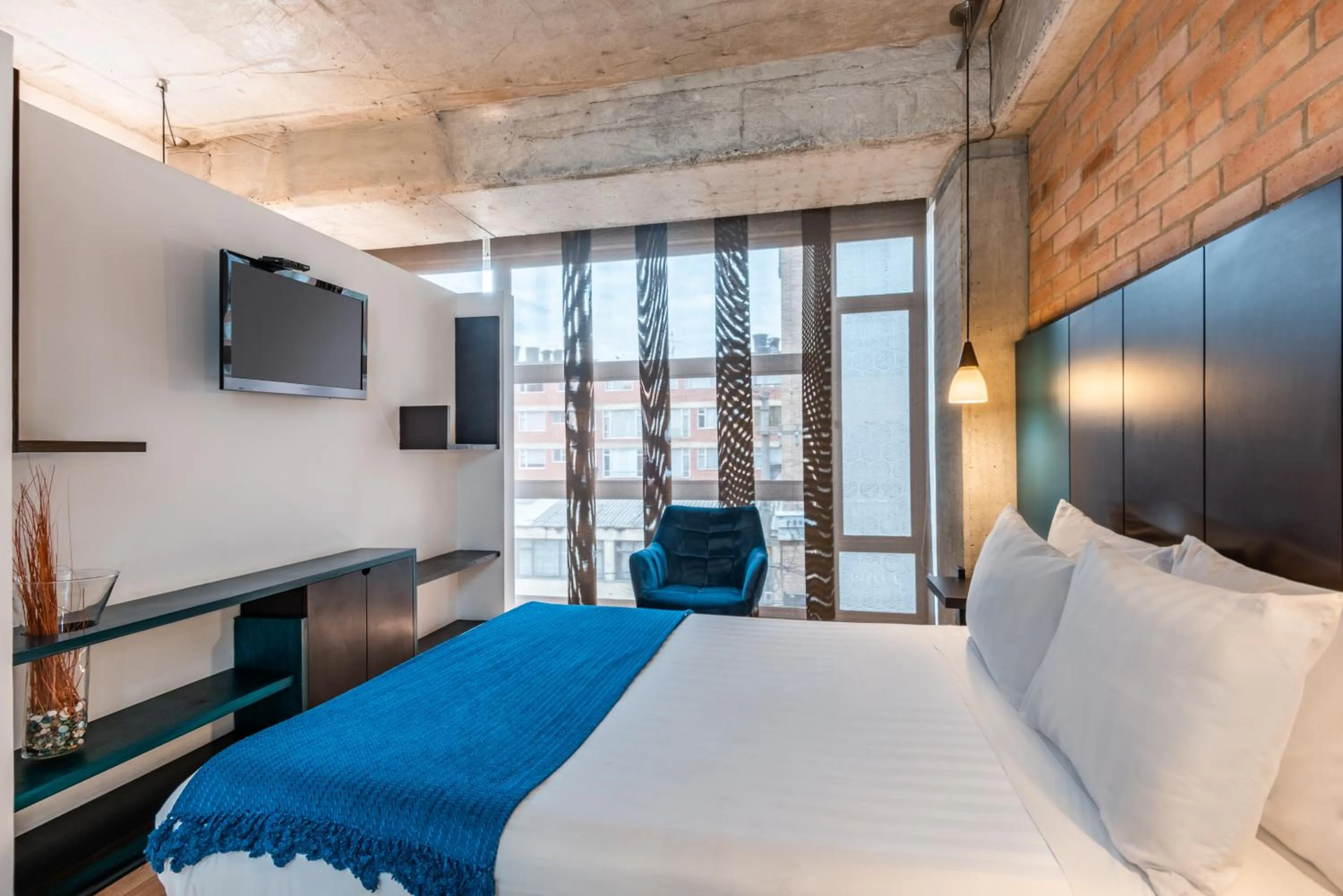 Bed in Hotel 5 Elementos Corferias by HBP