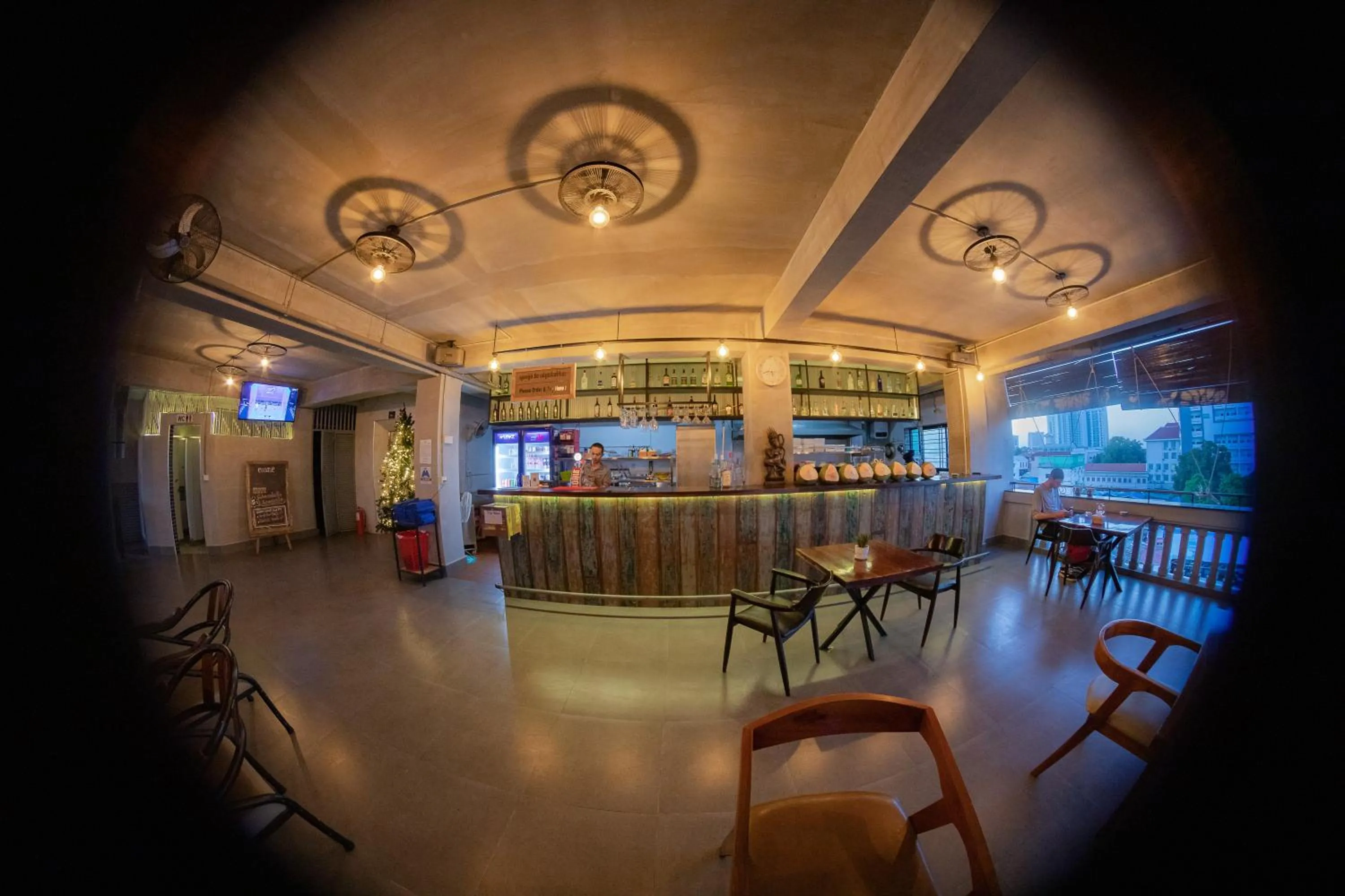 Communal lounge/ TV room in Pooltop Phnom Penh