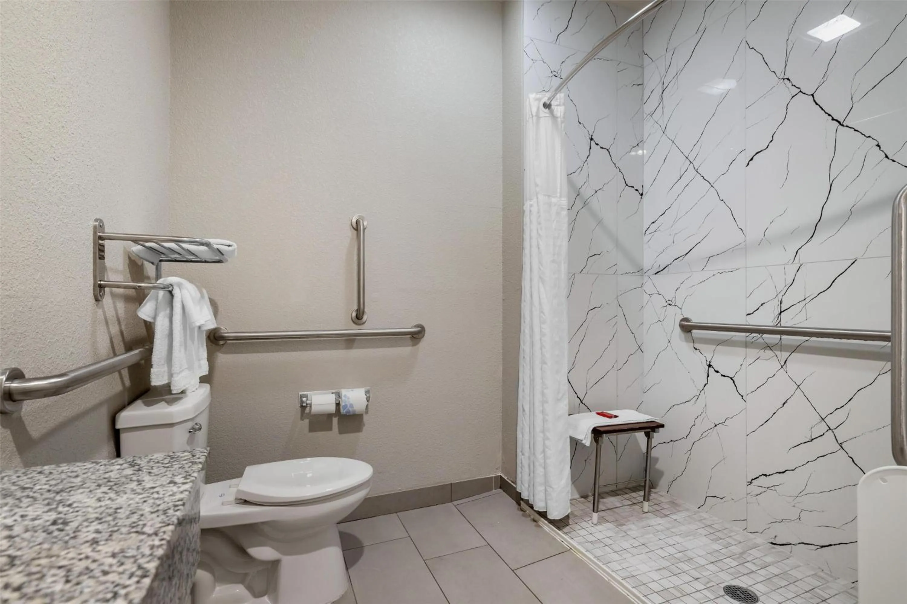 Bathroom in SureStay Plus Hotel by Best Western Ada