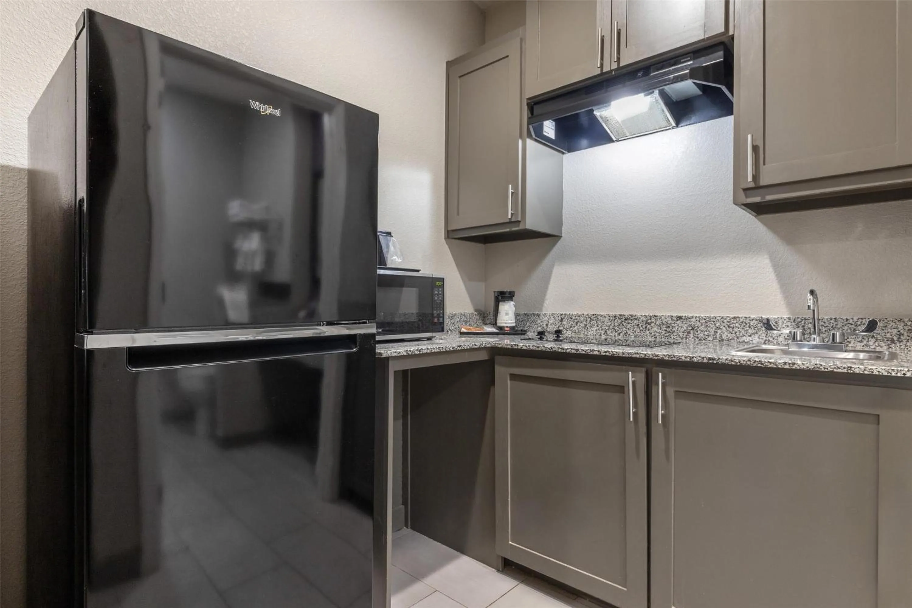 Bedroom in SureStay Plus Hotel by Best Western Ada