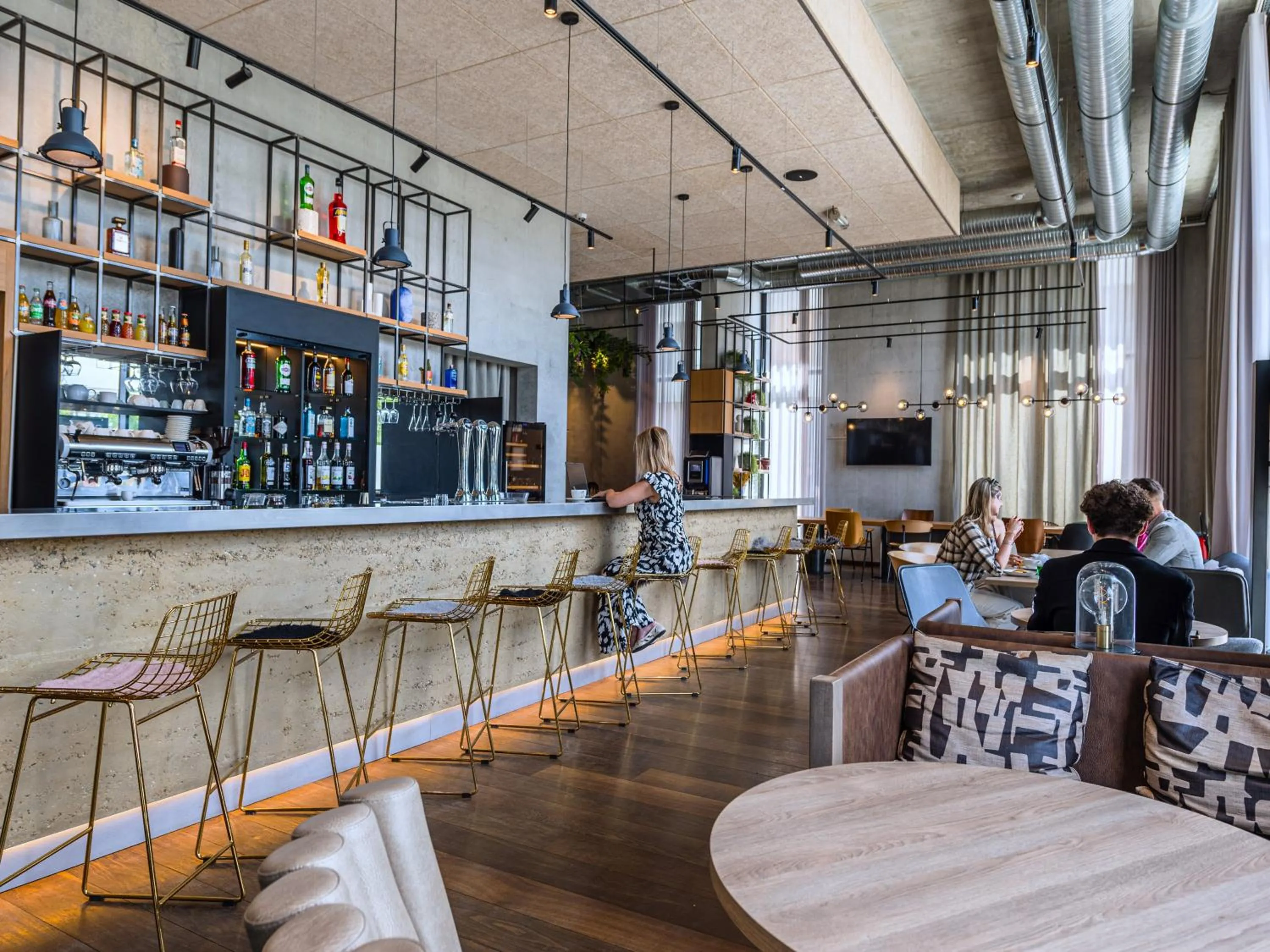 Communal lounge/ TV room in Novotel Annemasse Centre - Porte de Genève