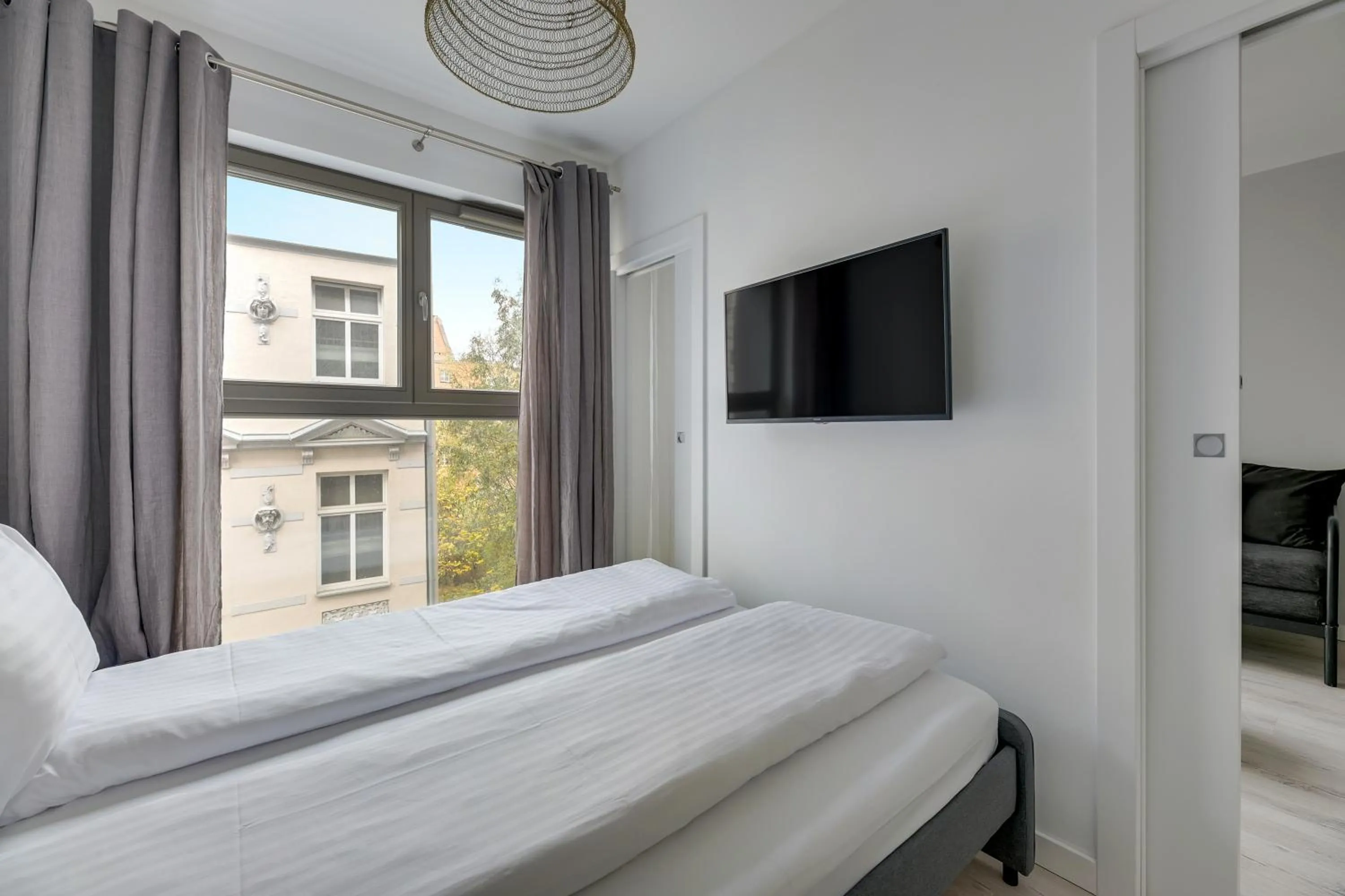 Bed in GRANO APARTMENTS Gdańsk Residence SPA & Wellness - GRANO APARTMENTS Gdańsk Old Town SPA & Wellness