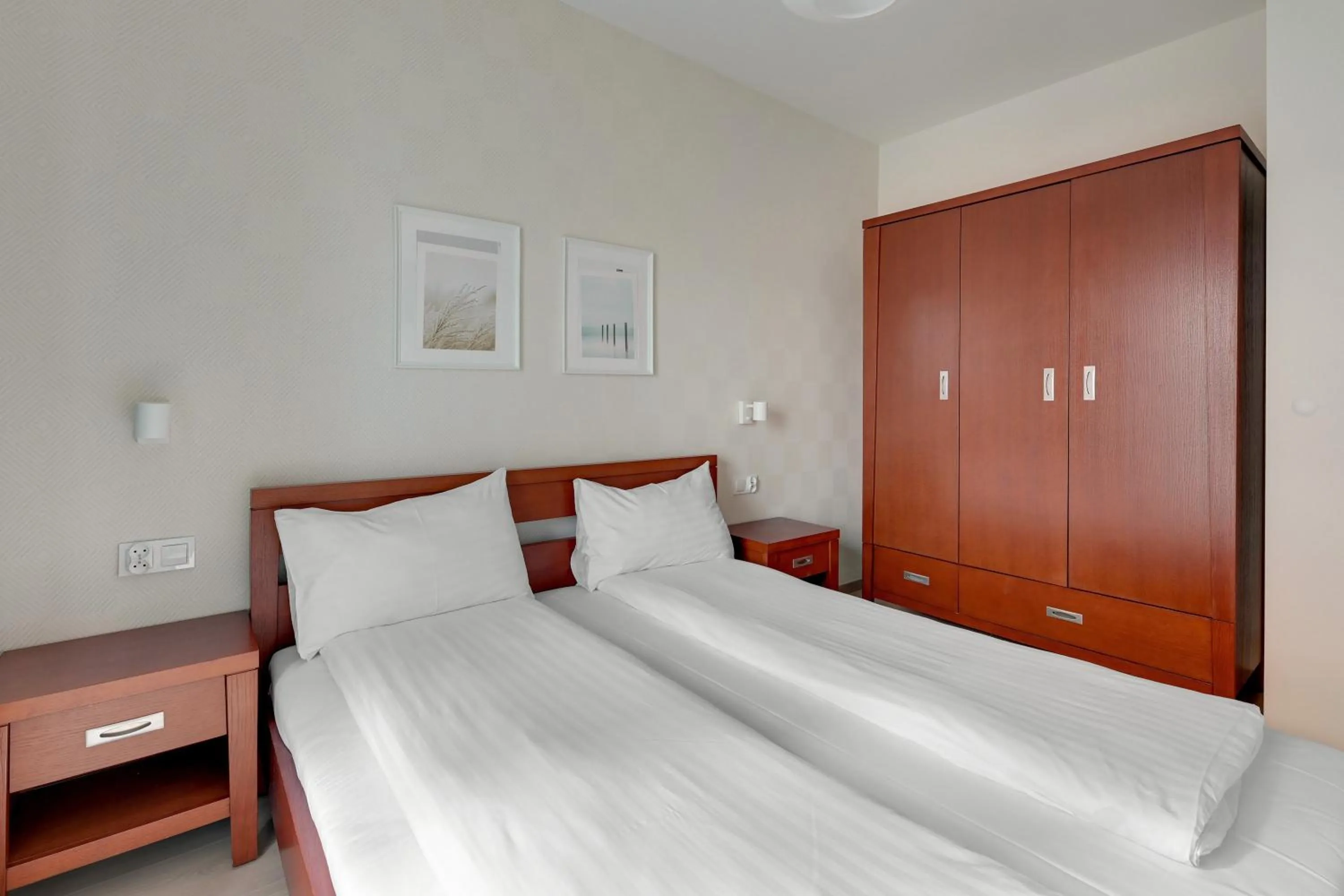 Bed in GRANO APARTMENTS Gdańsk Residence SPA & Wellness - GRANO APARTMENTS Gdańsk Old Town SPA & Wellness