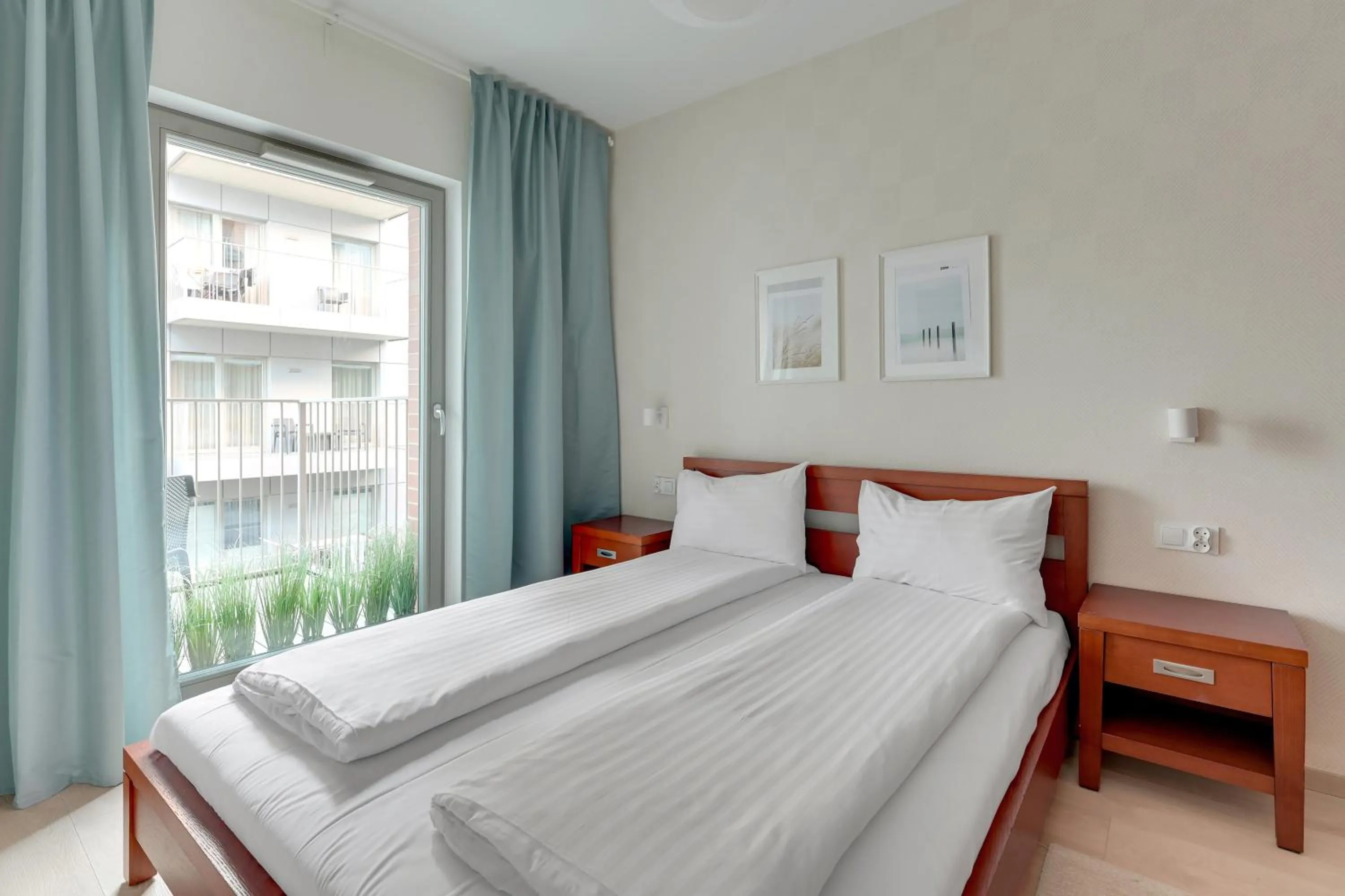 Bed in GRANO APARTMENTS Gdańsk Residence SPA & Wellness - GRANO APARTMENTS Gdańsk Old Town SPA & Wellness