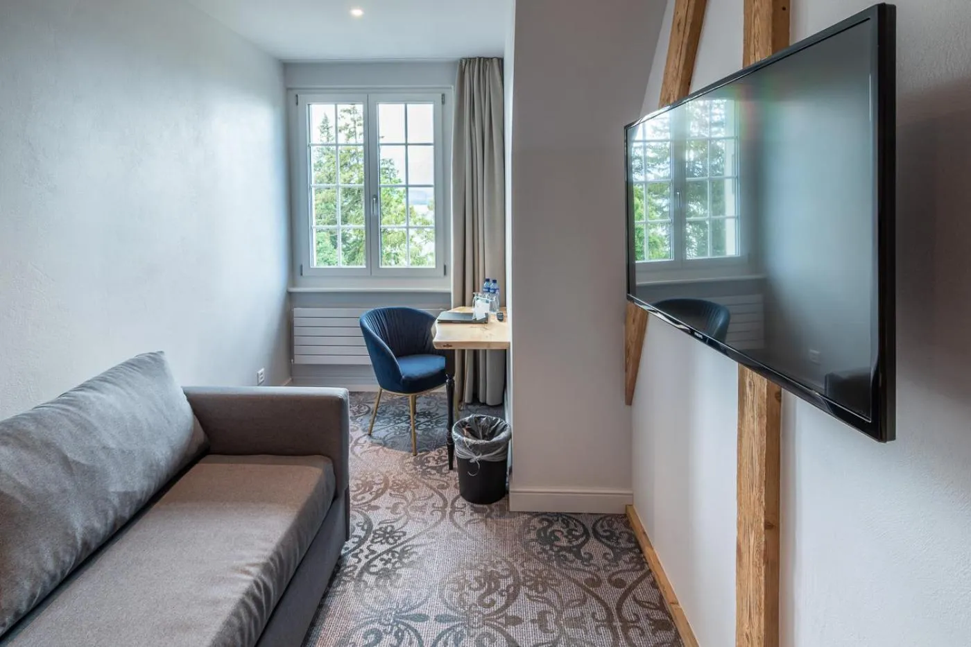 Seating area in Parkhotel Gunten – Beach & Spa