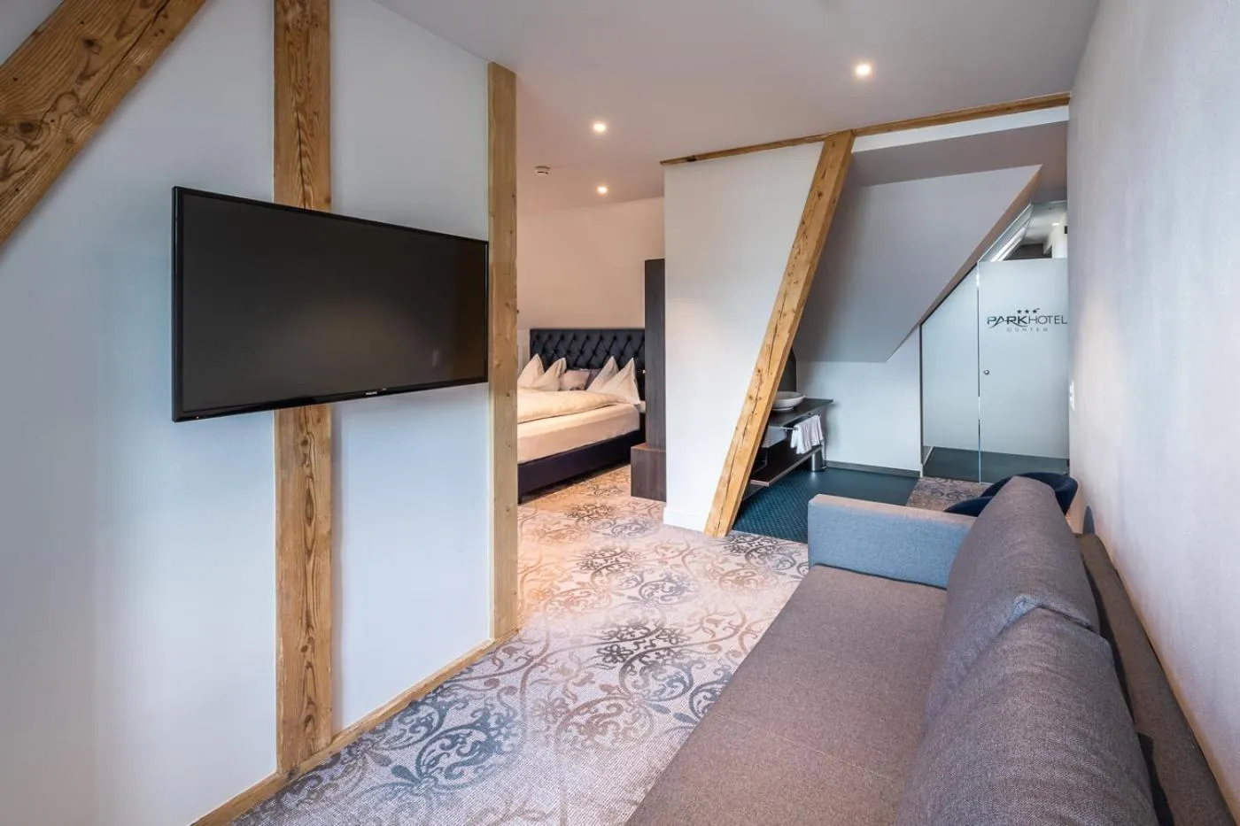 Seating area, Bed in Parkhotel Gunten – Beach & Spa