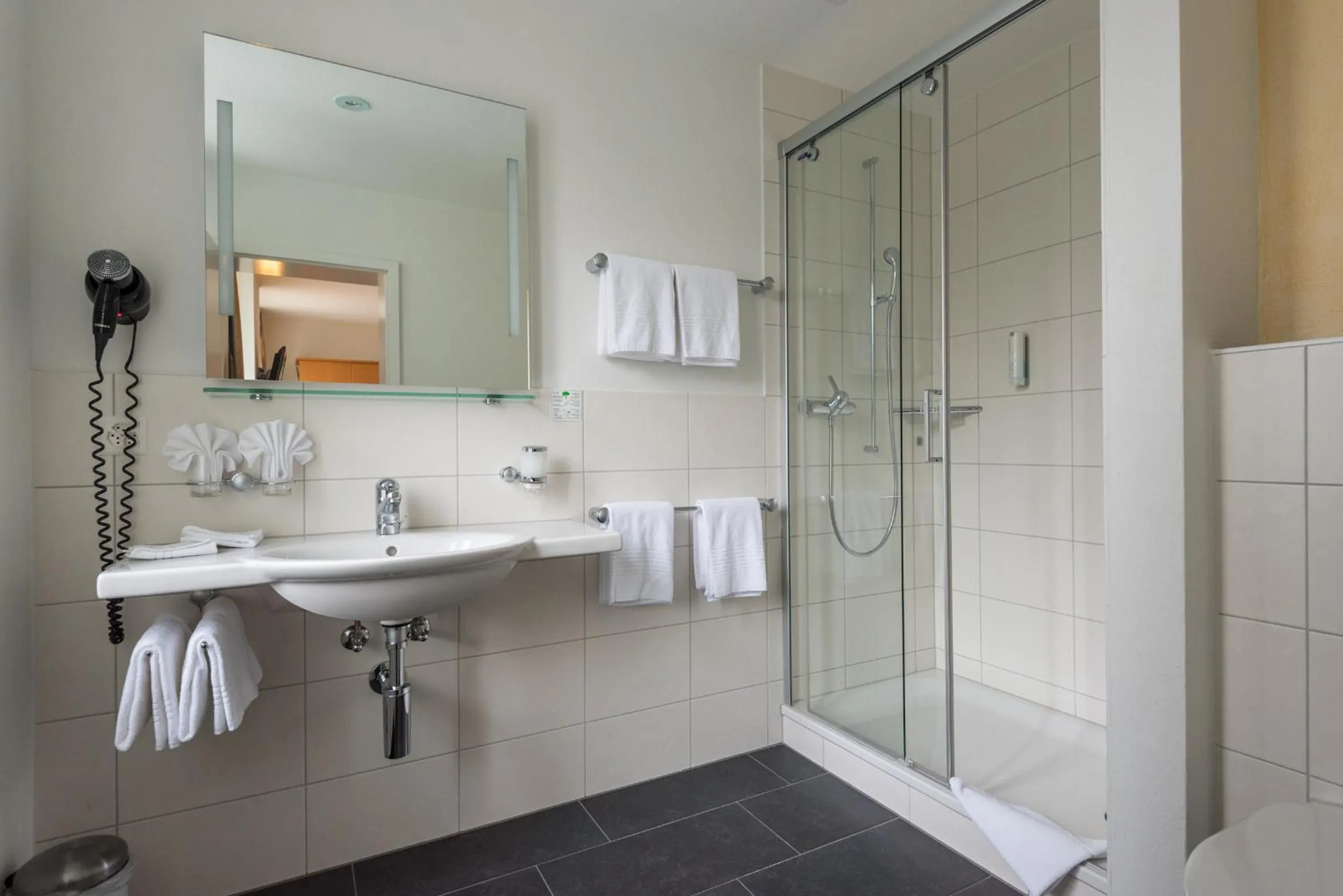 Bathroom in Parkhotel Gunten – Beach & Spa