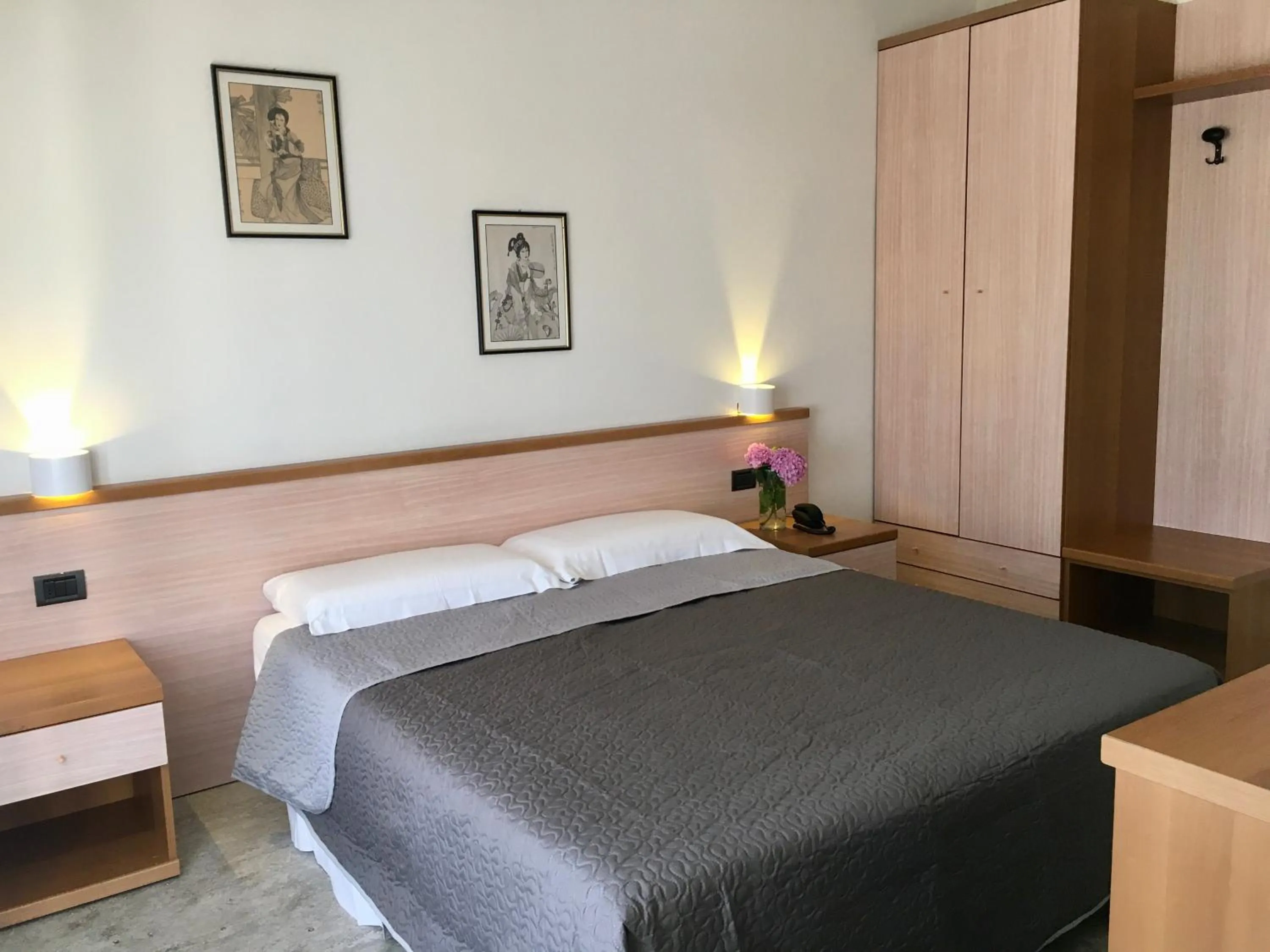 Bed in Hotel Trieste