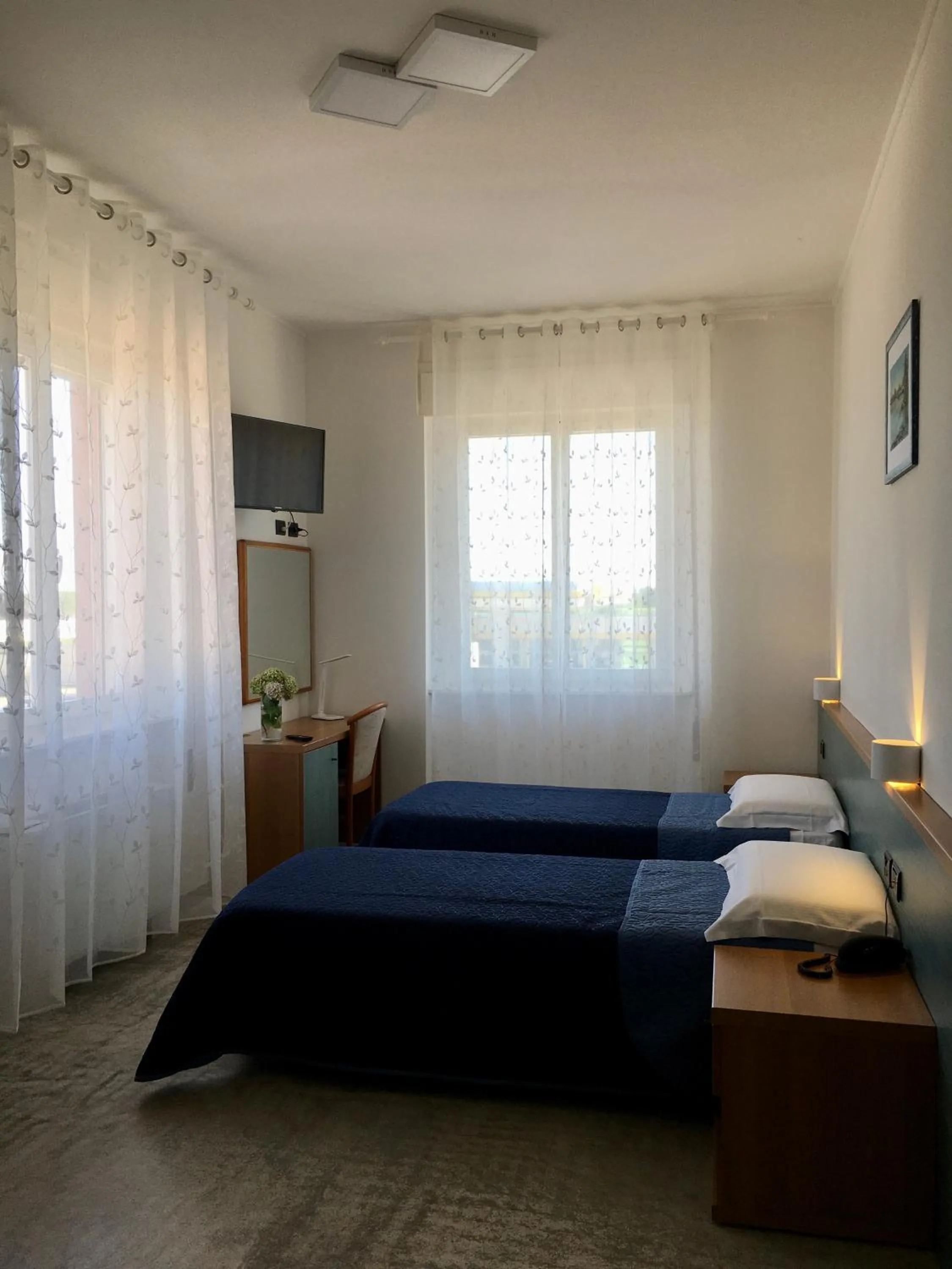 Bed in Hotel Trieste