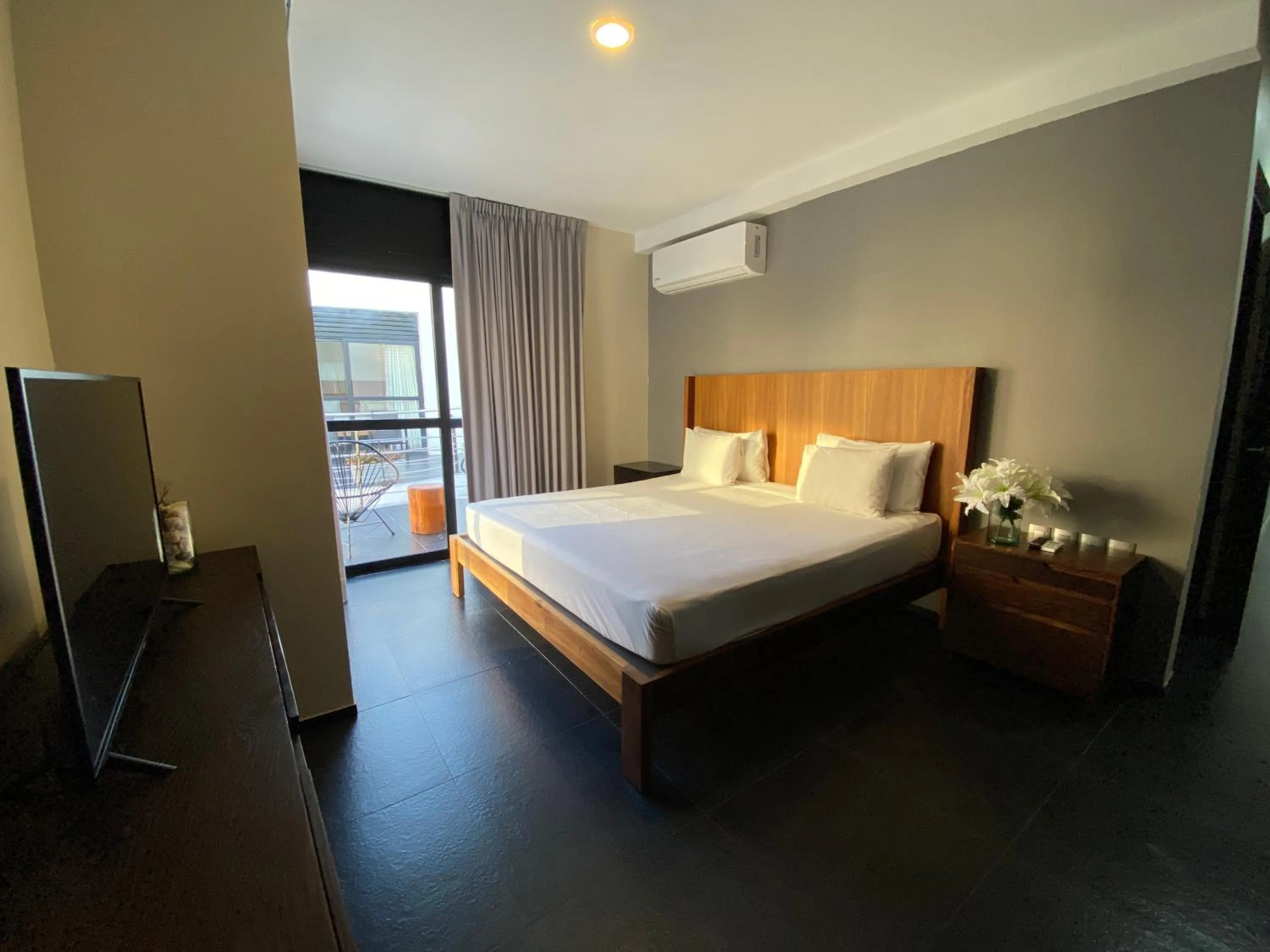 Bed in Sole Suites Apartments Playa del Carmen