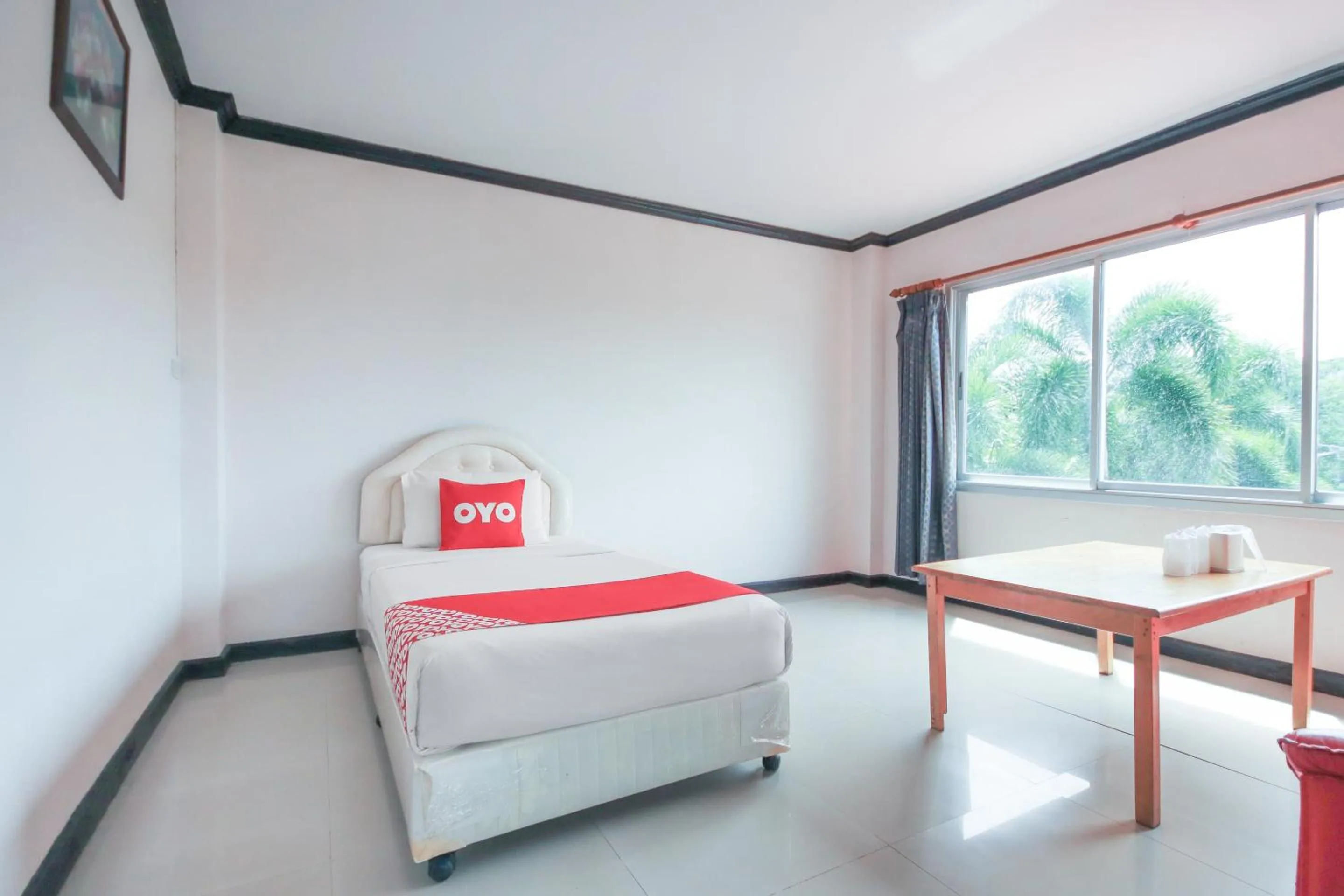 Bedroom in Prickhom Garden Hotel