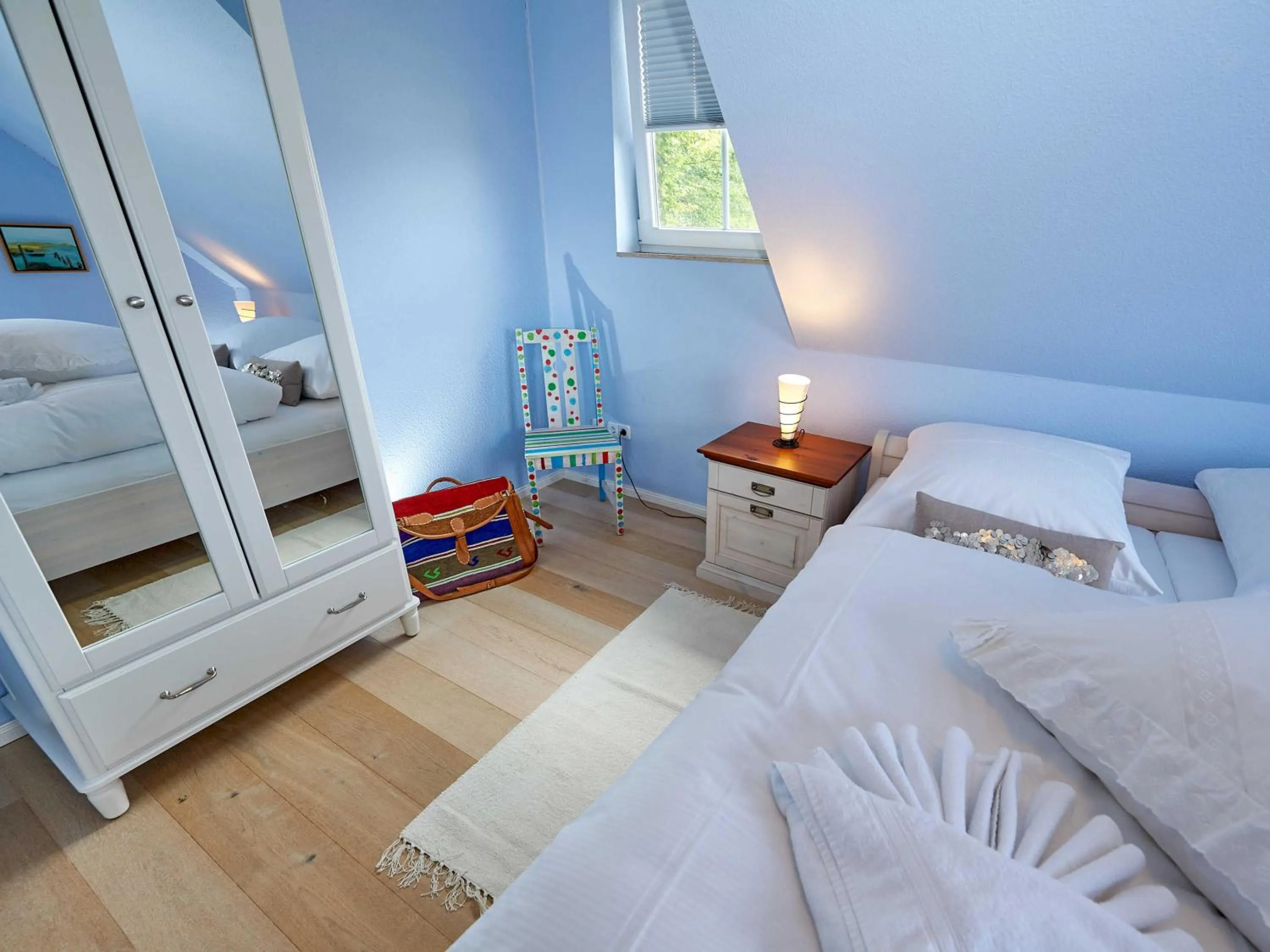 Bed in Ferienhaus Klünderberg in Binz mit Kamin, Terrasse, Strandkorb