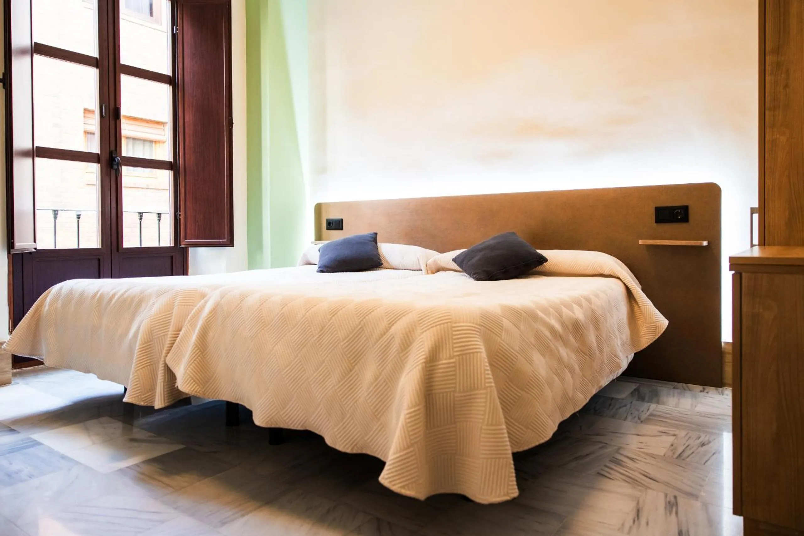 Bed in Apartamentos Reyes Católicos